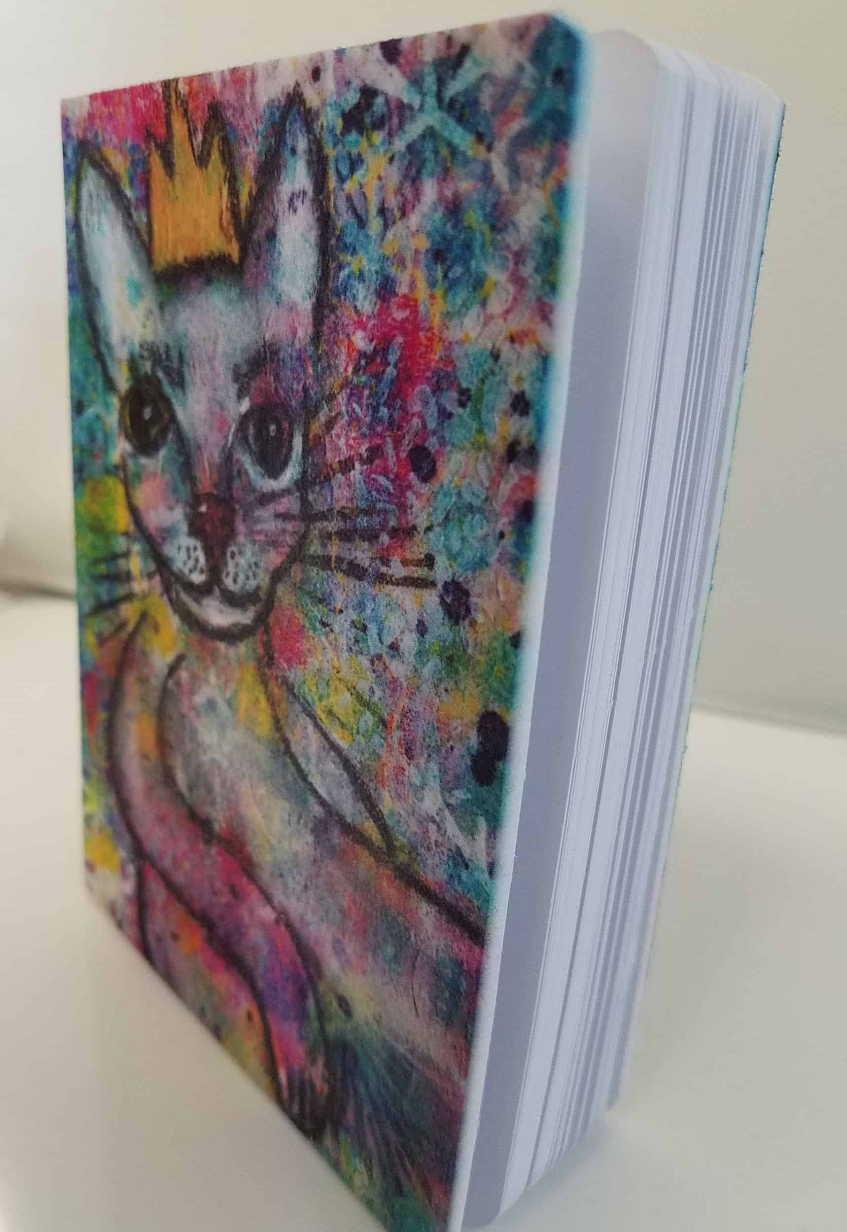 This Cool Cat "Luke" Crowned Critter Small Blank Journal for notes, lists, sketching and planning is made with love by Studio Patty D! Shop more unique gift ideas today with Spots Initiatives, the best way to support creators.