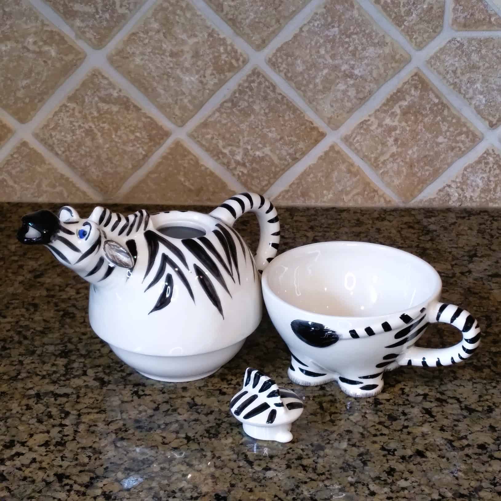 This Zebra Tea for One Teapot Decorative Kitchen Home Décor Blue Sky Clayworks is made with love by Premier Homegoods! Shop more unique gift ideas today with Spots Initiatives, the best way to support creators.