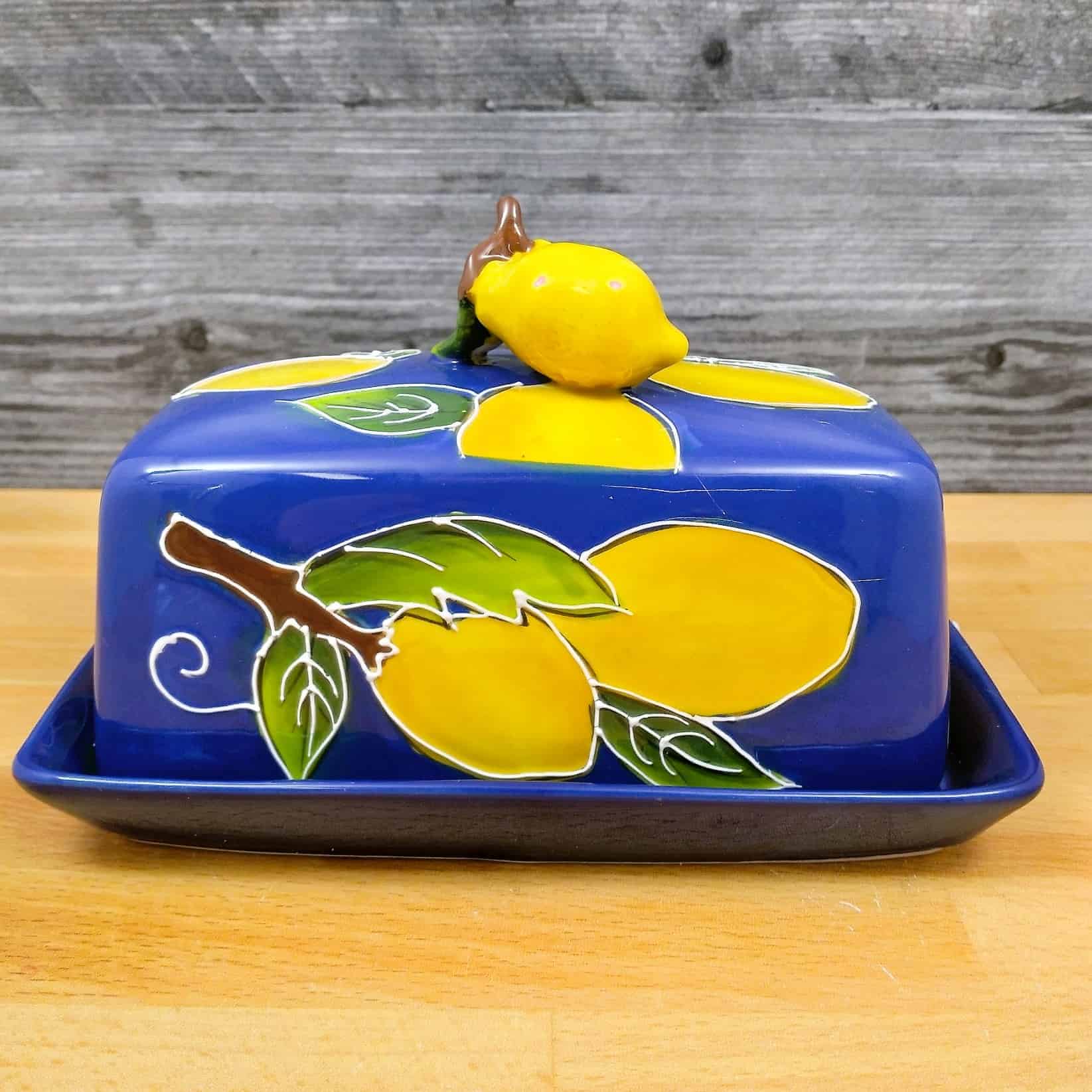 This Lemon Butter Dish Ceramic by Blue Sky Lynda Corneille is made with love by Premier Homegoods! Shop more unique gift ideas today with Spots Initiatives, the best way to support creators.