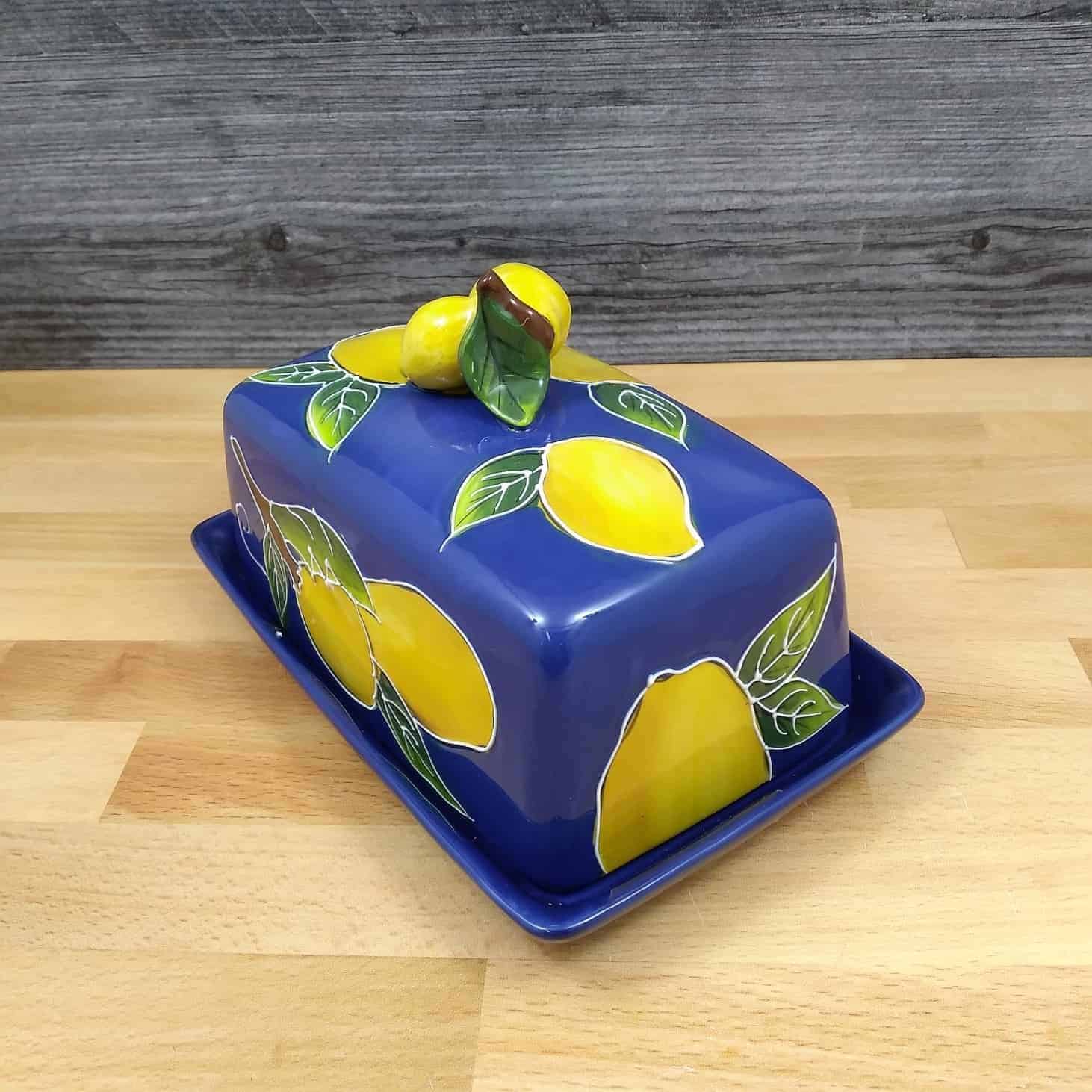 This Lemon Butter Dish Ceramic by Blue Sky Lynda Corneille is made with love by Premier Homegoods! Shop more unique gift ideas today with Spots Initiatives, the best way to support creators.