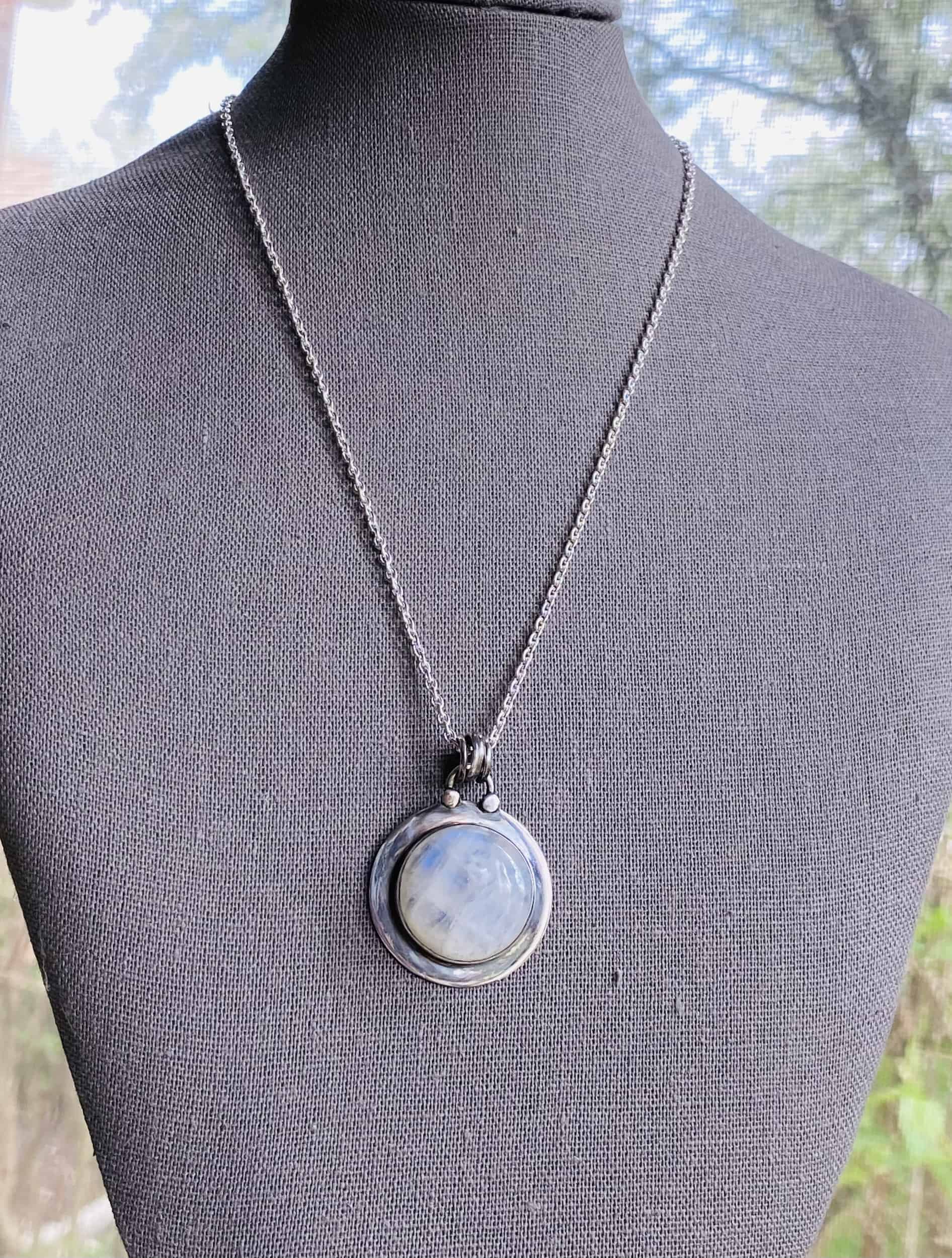 This Moon Aura - Moonstone Moon necklace sterling silver by Earth Karma is made with love by EARTH KARMA! Shop more unique gift ideas today with Spots Initiatives, the best way to support creators.