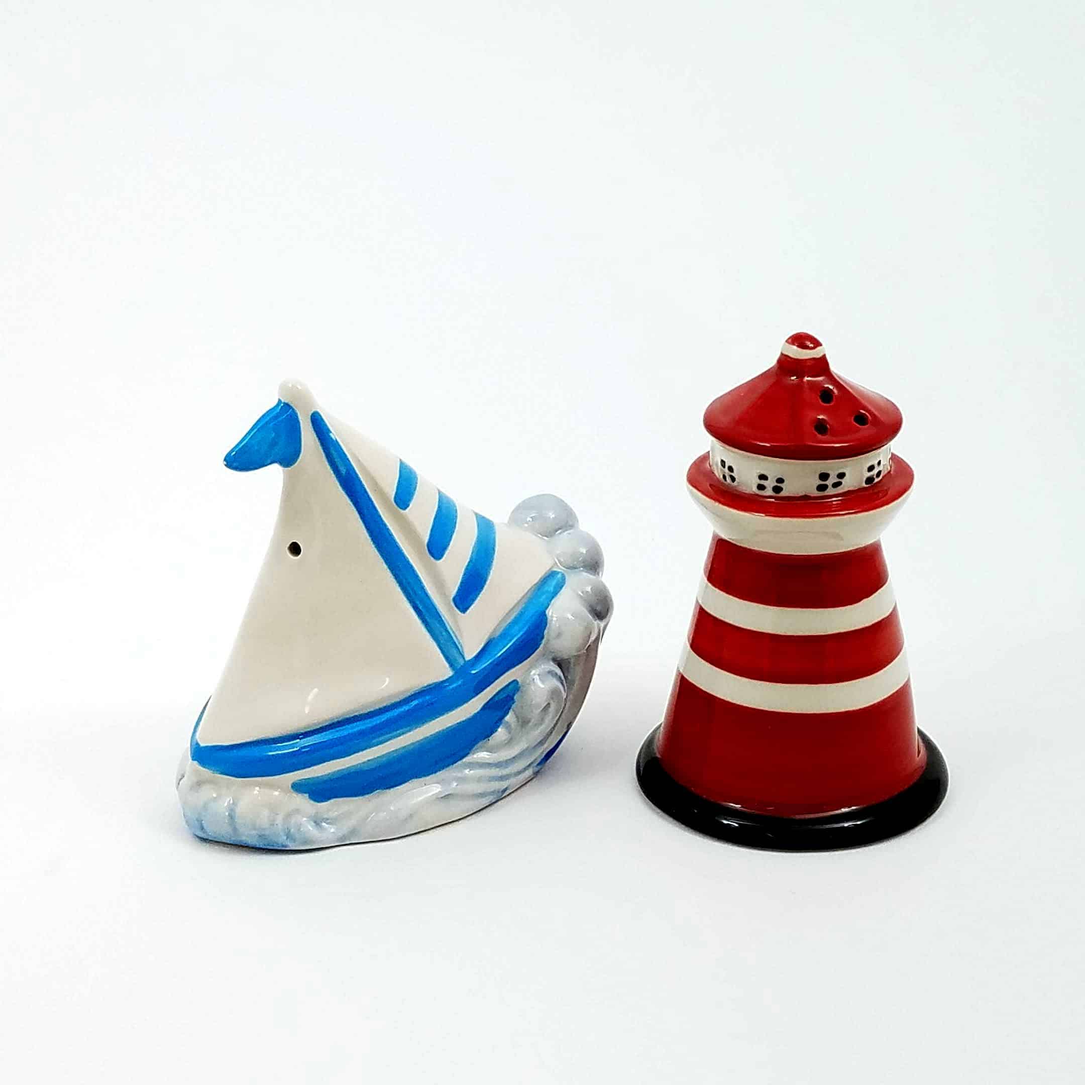This Salt and Pepper Set of a Sailboat & Light House Collectible Decorative is made with love by Premier Homegoods! Shop more unique gift ideas today with Spots Initiatives, the best way to support creators.