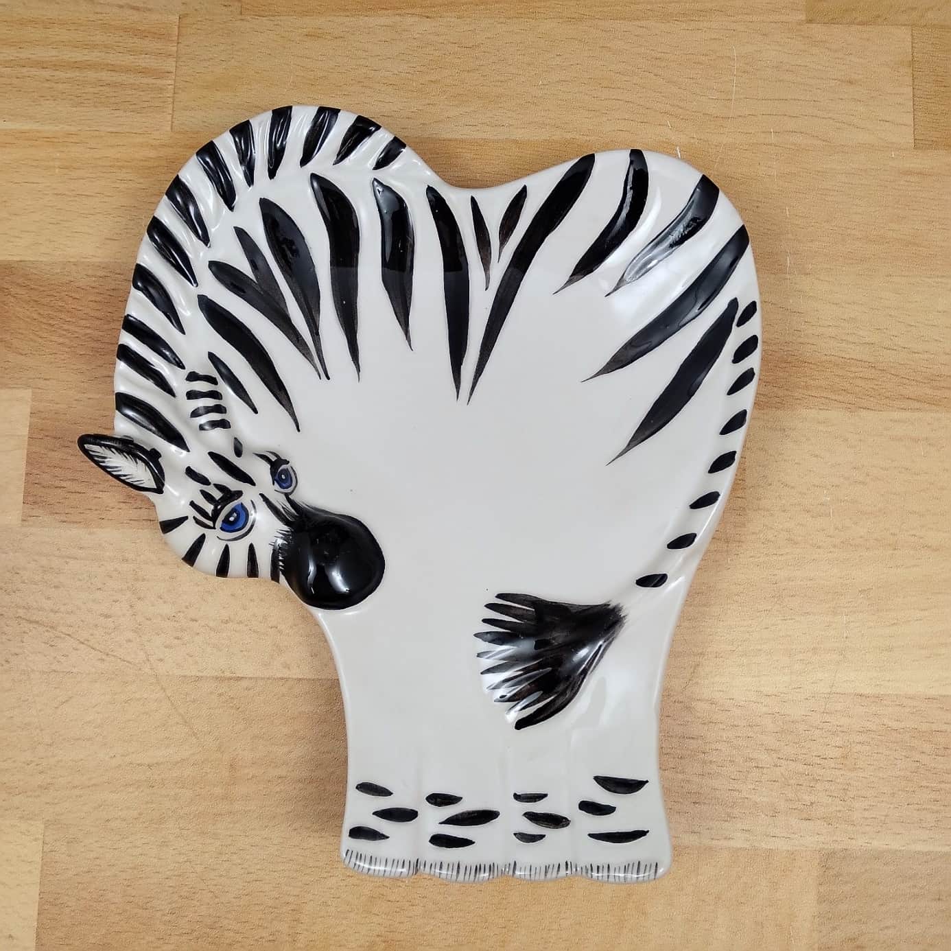 This Zebra Spoon Rest Ceramic by Blue and Sky Lynda Corneille is made with love by Premier Homegoods! Shop more unique gift ideas today with Spots Initiatives, the best way to support creators.