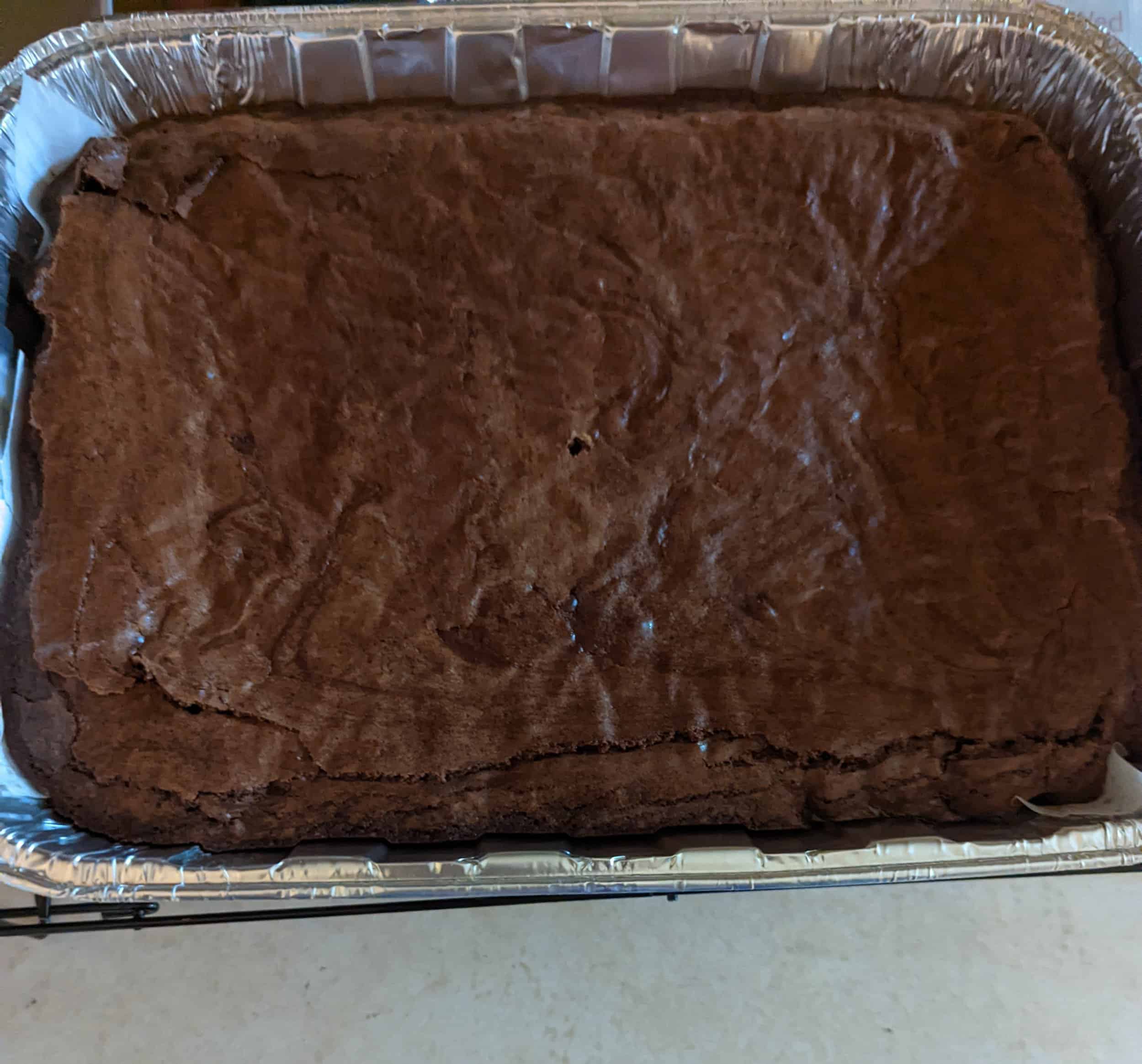 This Thick Brownies- Full pan is made with love by What A Delightful Treat! Shop more unique gift ideas today with Spots Initiatives, the best way to support creators.