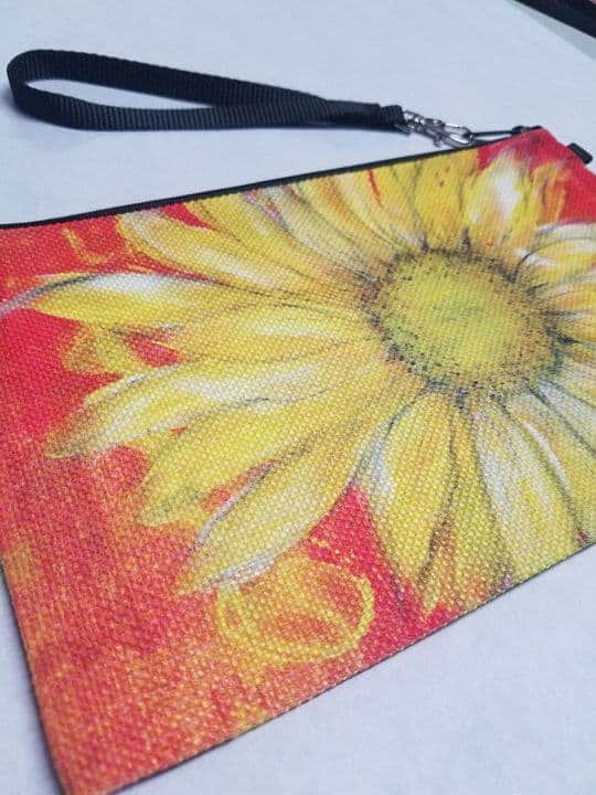 This Wristlet "Phoenix" is made with love by Studio Patty D! Shop more unique gift ideas today with Spots Initiatives, the best way to support creators.