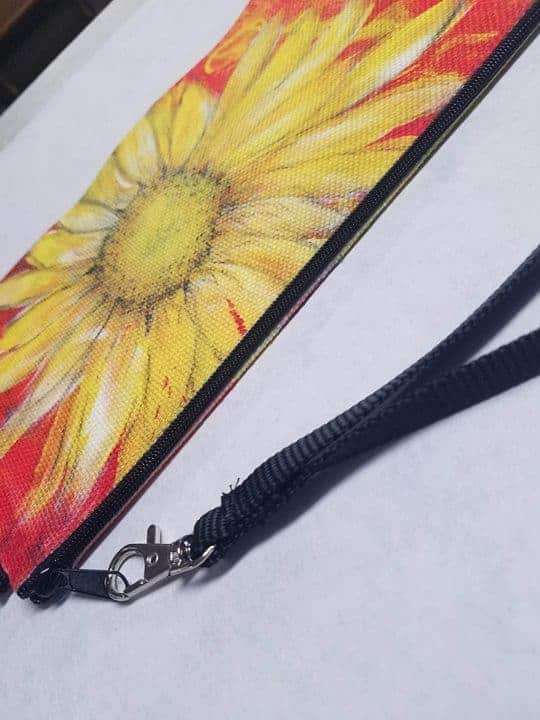 This Wristlet "Phoenix" is made with love by Studio Patty D! Shop more unique gift ideas today with Spots Initiatives, the best way to support creators.