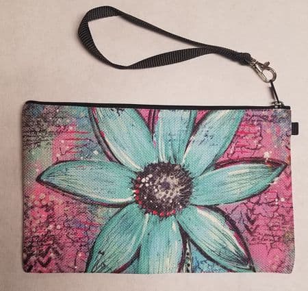 This Wristlet "Too Pink to be Blue" is made with love by Studio Patty D! Shop more unique gift ideas today with Spots Initiatives, the best way to support creators.