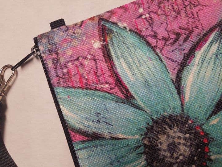 This Wristlet "Too Pink to be Blue" is made with love by Studio Patty D! Shop more unique gift ideas today with Spots Initiatives, the best way to support creators.