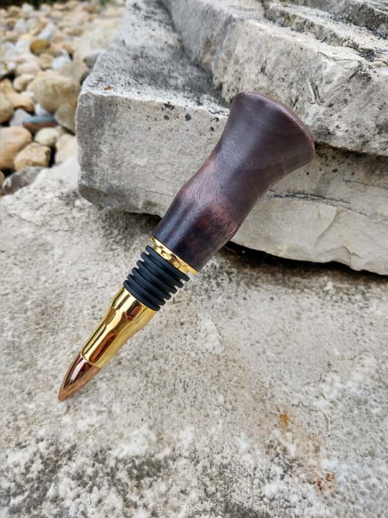 This 50 Caliber Bullet Wine Bottle Stopper is made with love by Blackbear Designs! Shop more unique gift ideas today with Spots Initiatives, the best way to support creators.