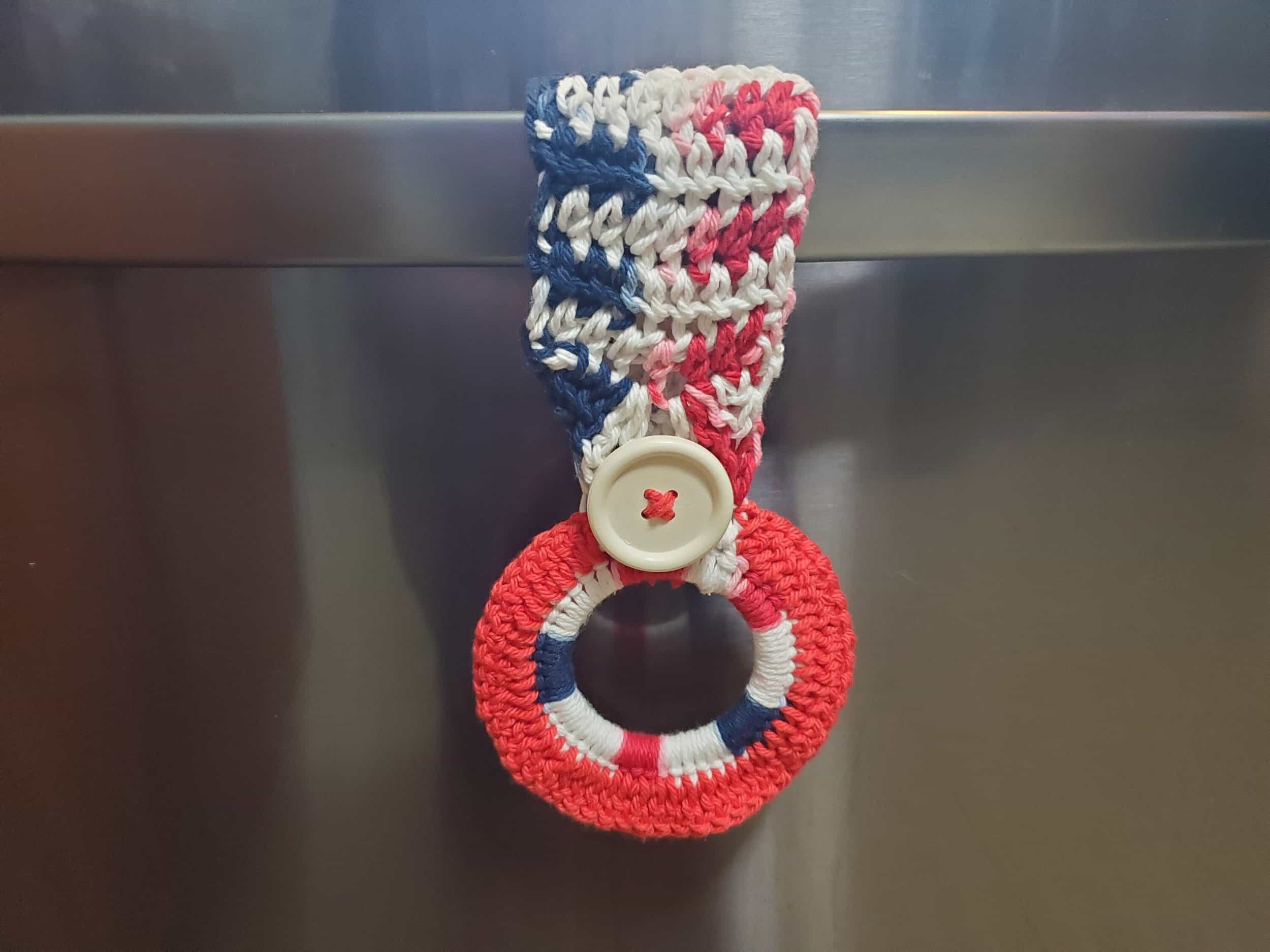 This Crochet Towel Holder Kitchen Towel Holder Hand Towel Holder Dishcloth Holder Dish Towel Holder Independence Day Themed Red, White and Blue is made with love by 3ChickswithSticks! Shop more unique gift ideas today with Spots Initiatives, the best way to support creators.