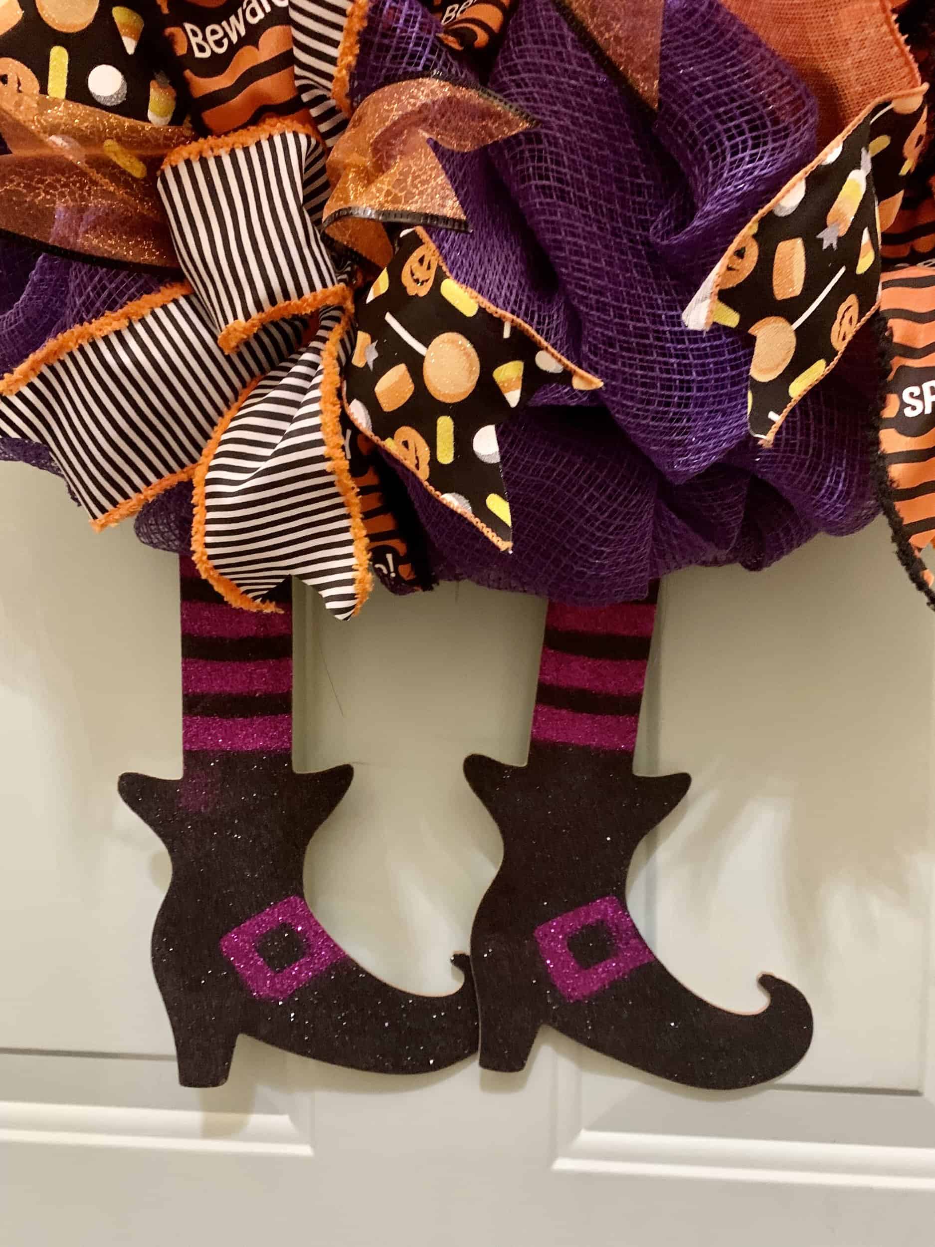 This Purple Halloween Witch wreath with legs is made with love by Willow Chic Designs! Shop more unique gift ideas today with Spots Initiatives, the best way to support creators.