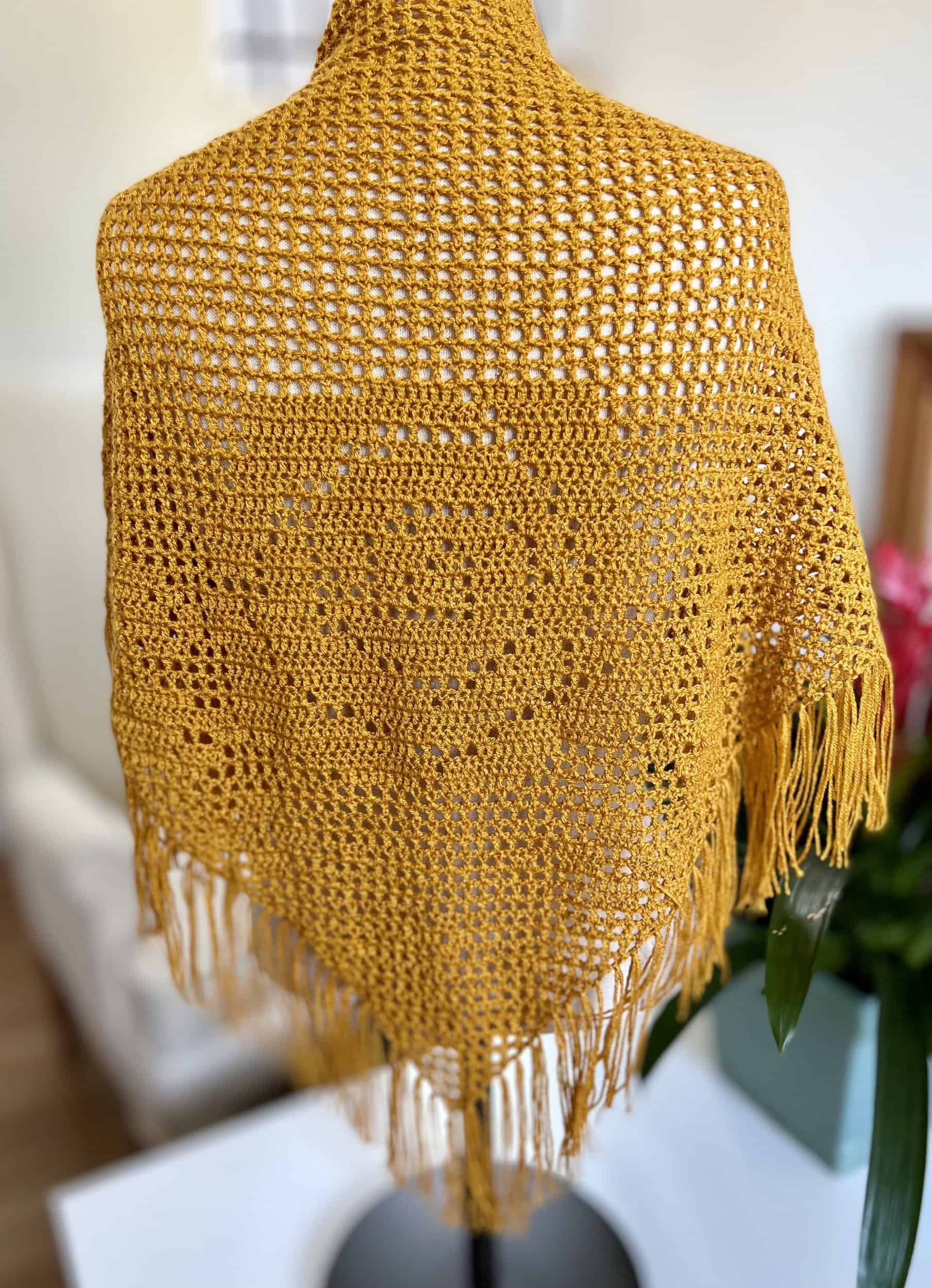 This Golden Rose Shawl is made with love by Classy Crafty Wife! Shop more unique gift ideas today with Spots Initiatives, the best way to support creators.