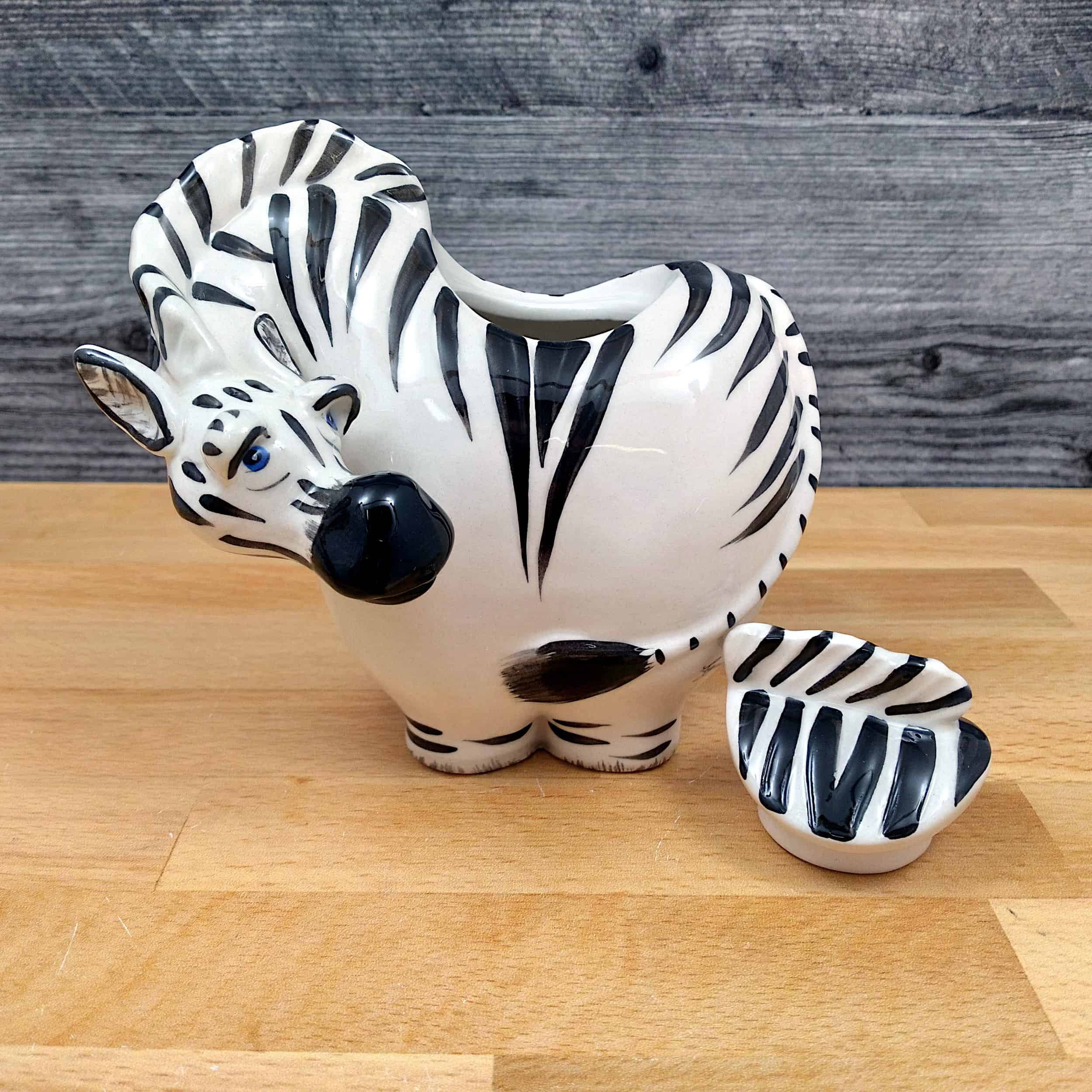 This Zebra Sugar Bowl and Creamer Set Decorative by Blue Sky is made with love by Premier Homegoods! Shop more unique gift ideas today with Spots Initiatives, the best way to support creators.
