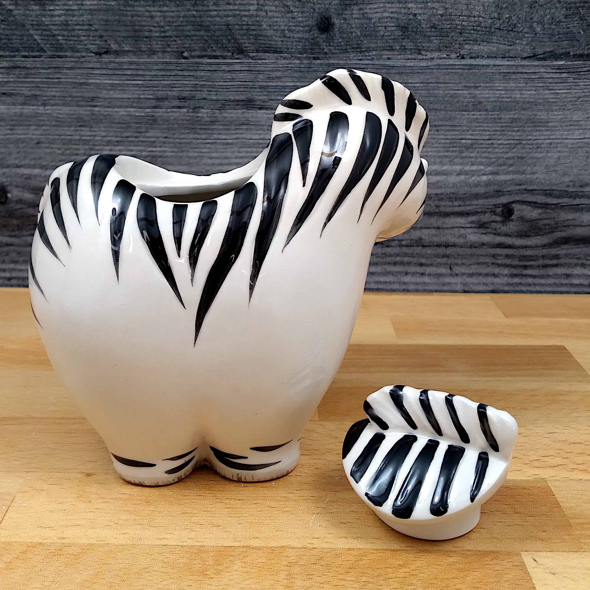 This Zebra Sugar Bowl and Creamer Set Decorative by Blue Sky is made with love by Premier Homegoods! Shop more unique gift ideas today with Spots Initiatives, the best way to support creators.