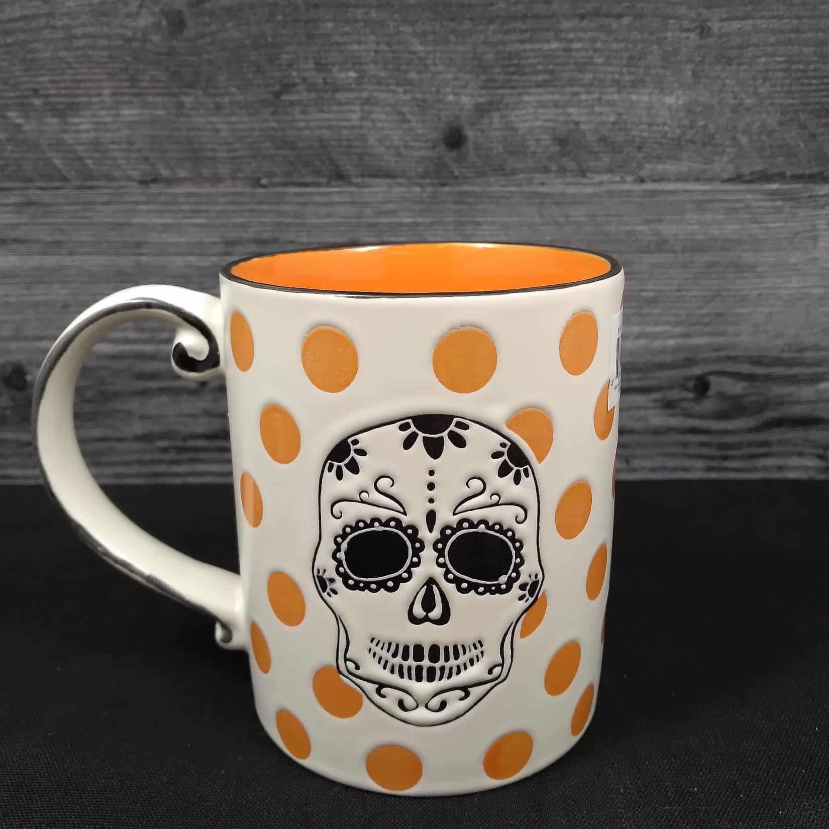 This Halloween Skull Coffee Mug Beverage Tea Cup 16oz 473ml by Blue Sky is made with love by Premier Homegoods! Shop more unique gift ideas today with Spots Initiatives, the best way to support creators.