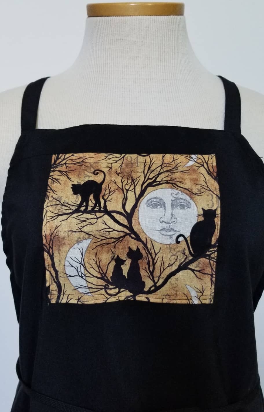 This Black Cat, Moon and Trees Apron with Pockets is made with love by The Creative Soul Sisters! Shop more unique gift ideas today with Spots Initiatives, the best way to support creators.