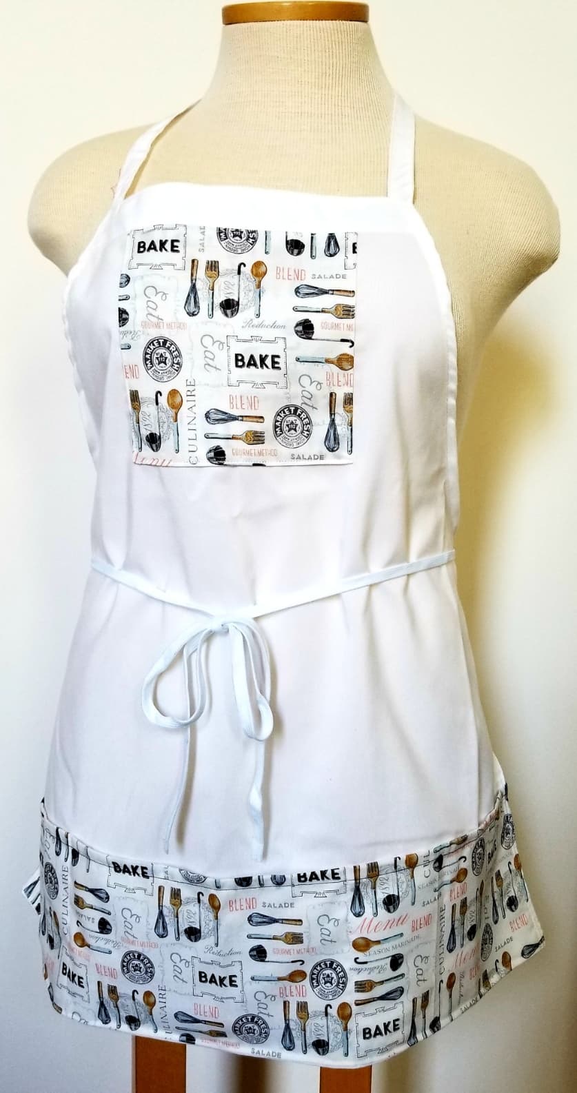 This White Baker or Chef Apron with Pockets is made with love by The Creative Soul Sisters! Shop more unique gift ideas today with Spots Initiatives, the best way to support creators.