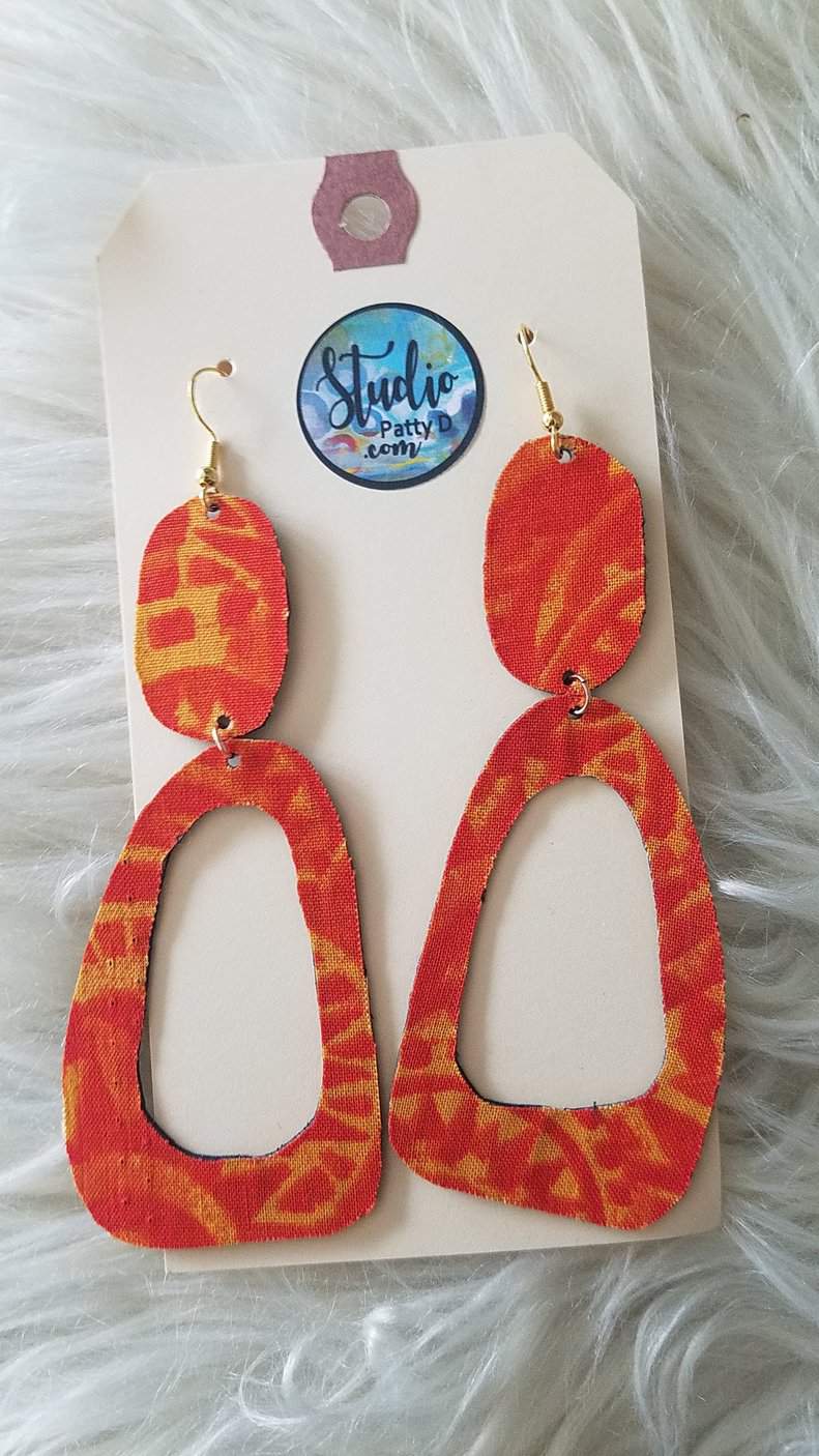 This Statement Earrings - orange harvest is made with love by Studio Patty D! Shop more unique gift ideas today with Spots Initiatives, the best way to support creators.