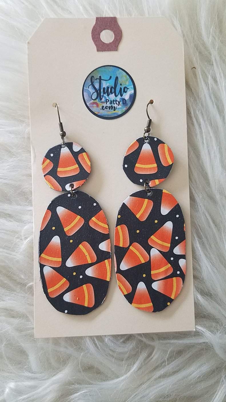This Candy Corn, Halloween Earrings is made with love by Studio Patty D! Shop more unique gift ideas today with Spots Initiatives, the best way to support creators.