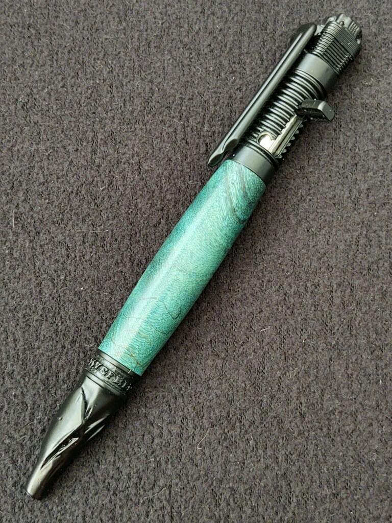 This Stabilized Dyed Turquoise Buckeye Burl Motorcycle Pen with Matte Black Hardware is made with love by Blackbear Designs! Shop more unique gift ideas today with Spots Initiatives, the best way to support creators.