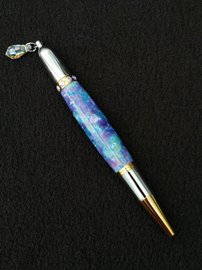 This Purple & Teal Diva Charm Pen is made with love by Blackbear Designs! Shop more unique gift ideas today with Spots Initiatives, the best way to support creators.