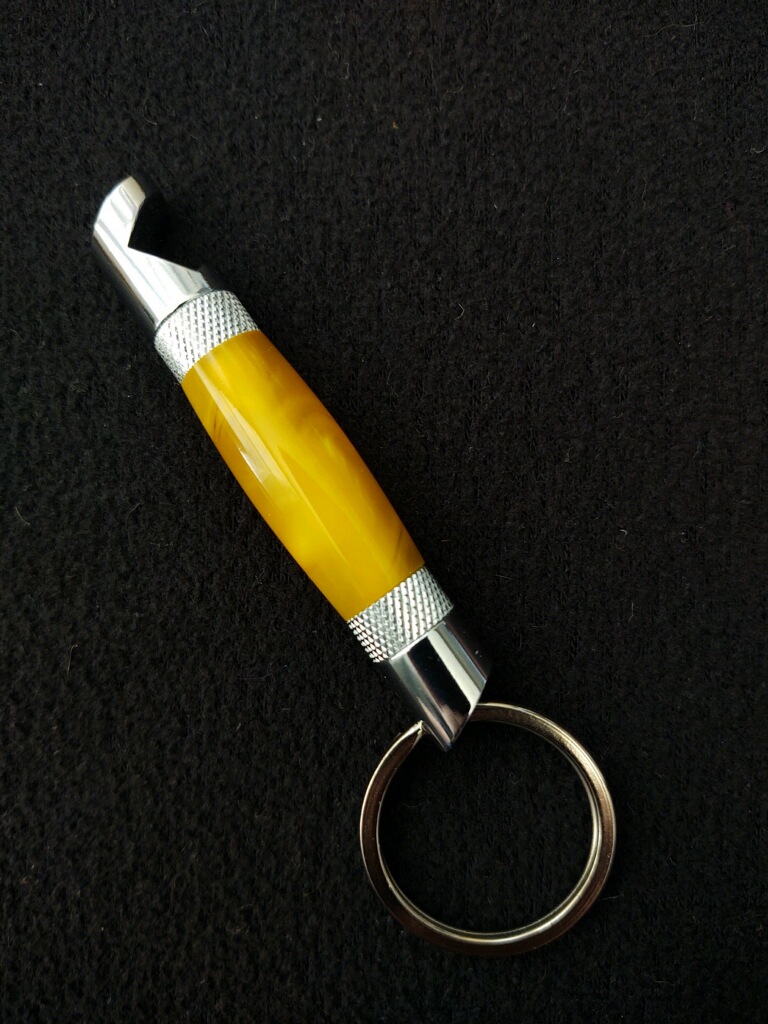 This Yellow Acrylic Bottle Opener Keychain is made with love by Blackbear Designs! Shop more unique gift ideas today with Spots Initiatives, the best way to support creators.