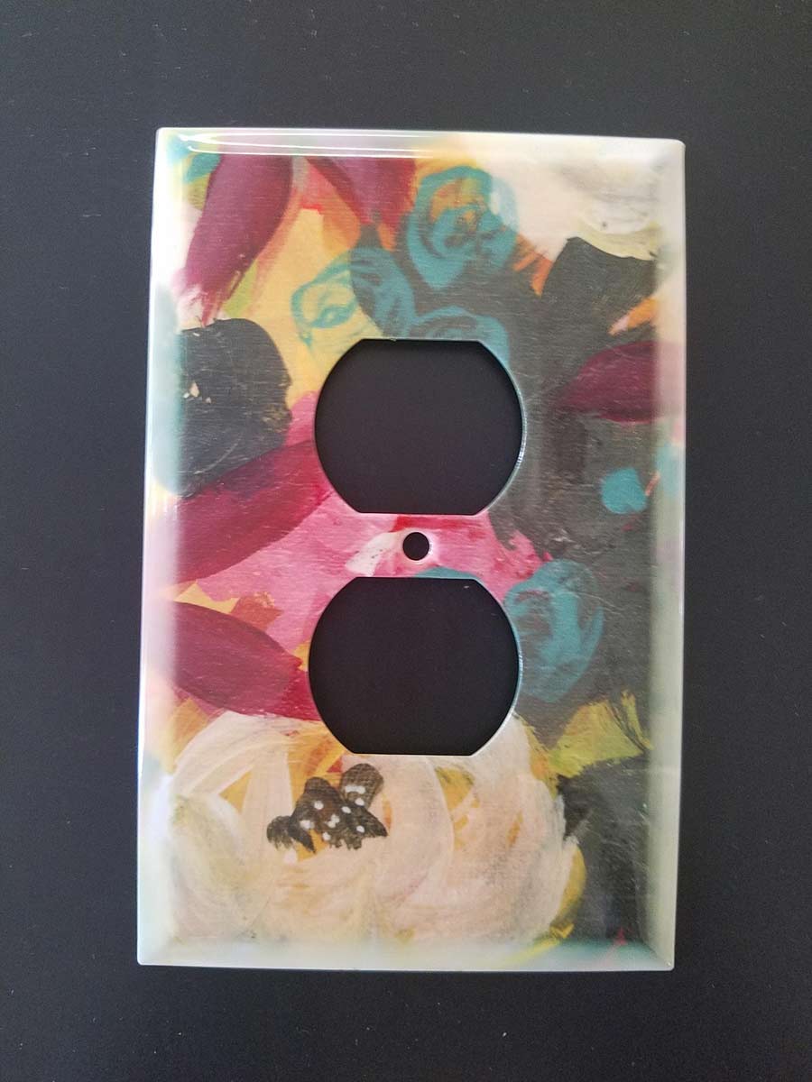 This Duplex Outlet Cover - Ruby Floral Abstract is made with love by Studio Patty D! Shop more unique gift ideas today with Spots Initiatives, the best way to support creators.