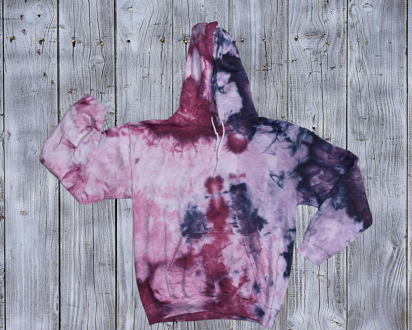 This Medium Ice Dyed Hoodie is made with love by Rainbow Sunshine Dye by Sol! Shop more unique gift ideas today with Spots Initiatives, the best way to support creators.