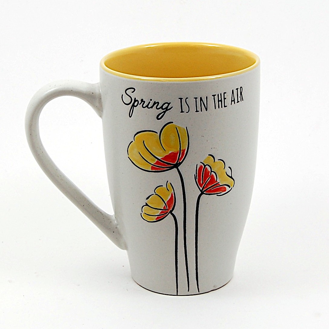 This Coffee Mug Spring Is In The Air Cup with Floral Design by Blue Sky Clayworks is made with love by Premier Homegoods! Shop more unique gift ideas today with Spots Initiatives, the best way to support creators.