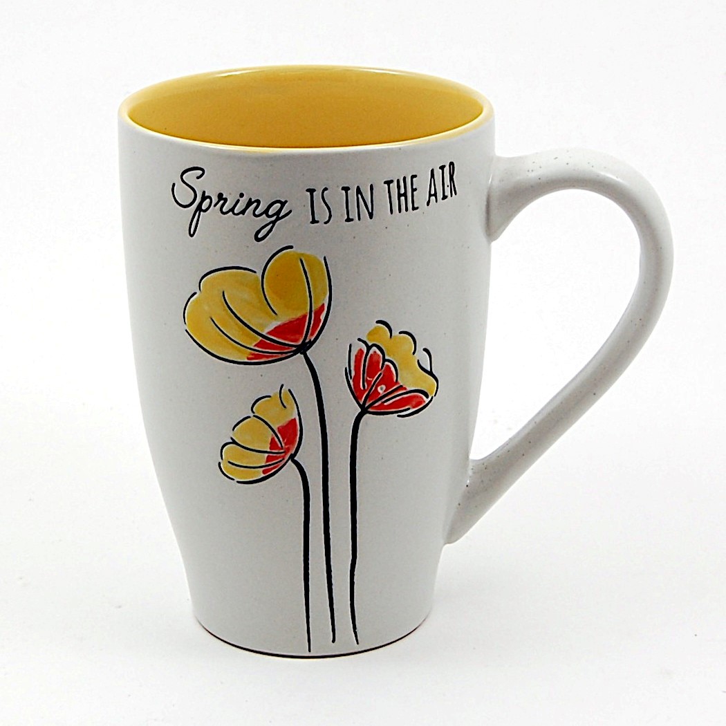 This Coffee Mug Spring Is In The Air Cup with Floral Design by Blue Sky Clayworks is made with love by Premier Homegoods! Shop more unique gift ideas today with Spots Initiatives, the best way to support creators.