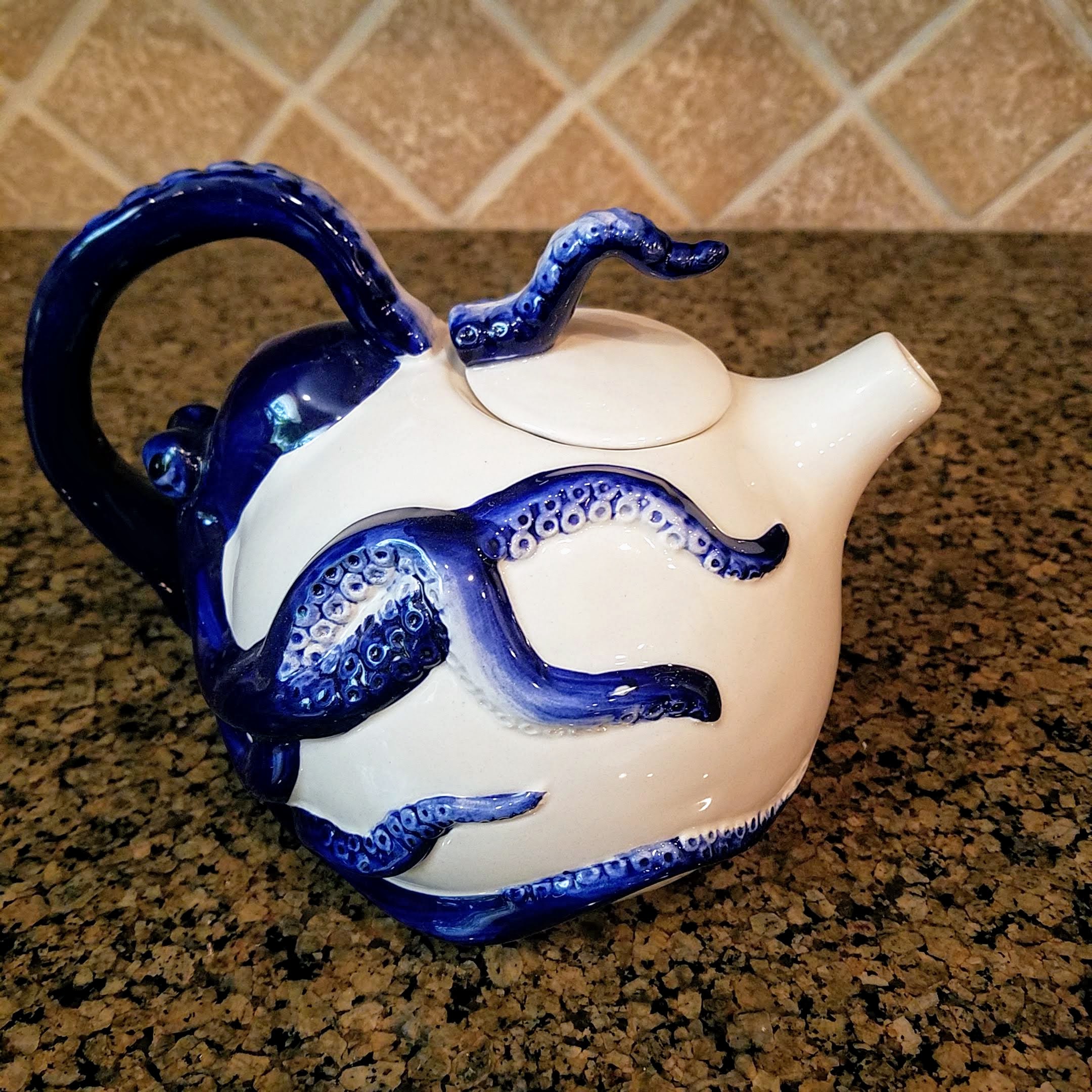 This Blue Octopus Ceramic Teapot Decorative Collectable Kitchen Décor Goldmic New is made with love by Premier Homegoods! Shop more unique gift ideas today with Spots Initiatives, the best way to support creators.