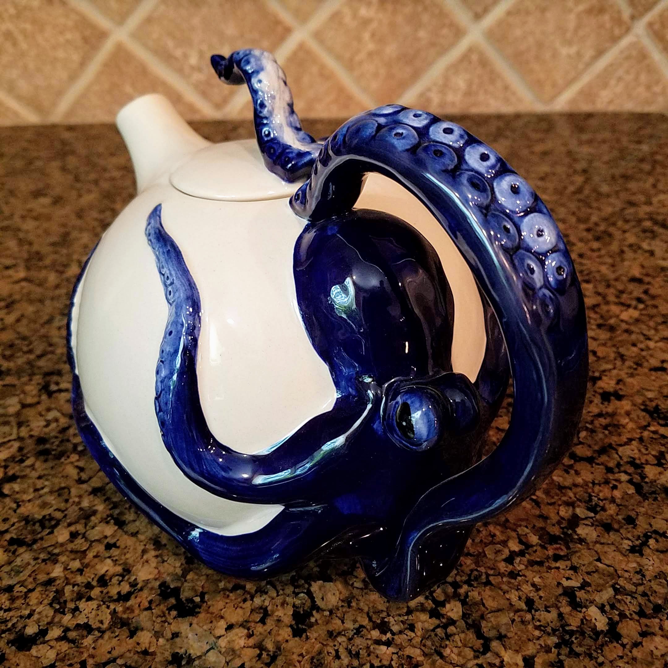 This Blue Octopus Ceramic Teapot Decorative Collectable Kitchen Décor Goldmic New is made with love by Premier Homegoods! Shop more unique gift ideas today with Spots Initiatives, the best way to support creators.