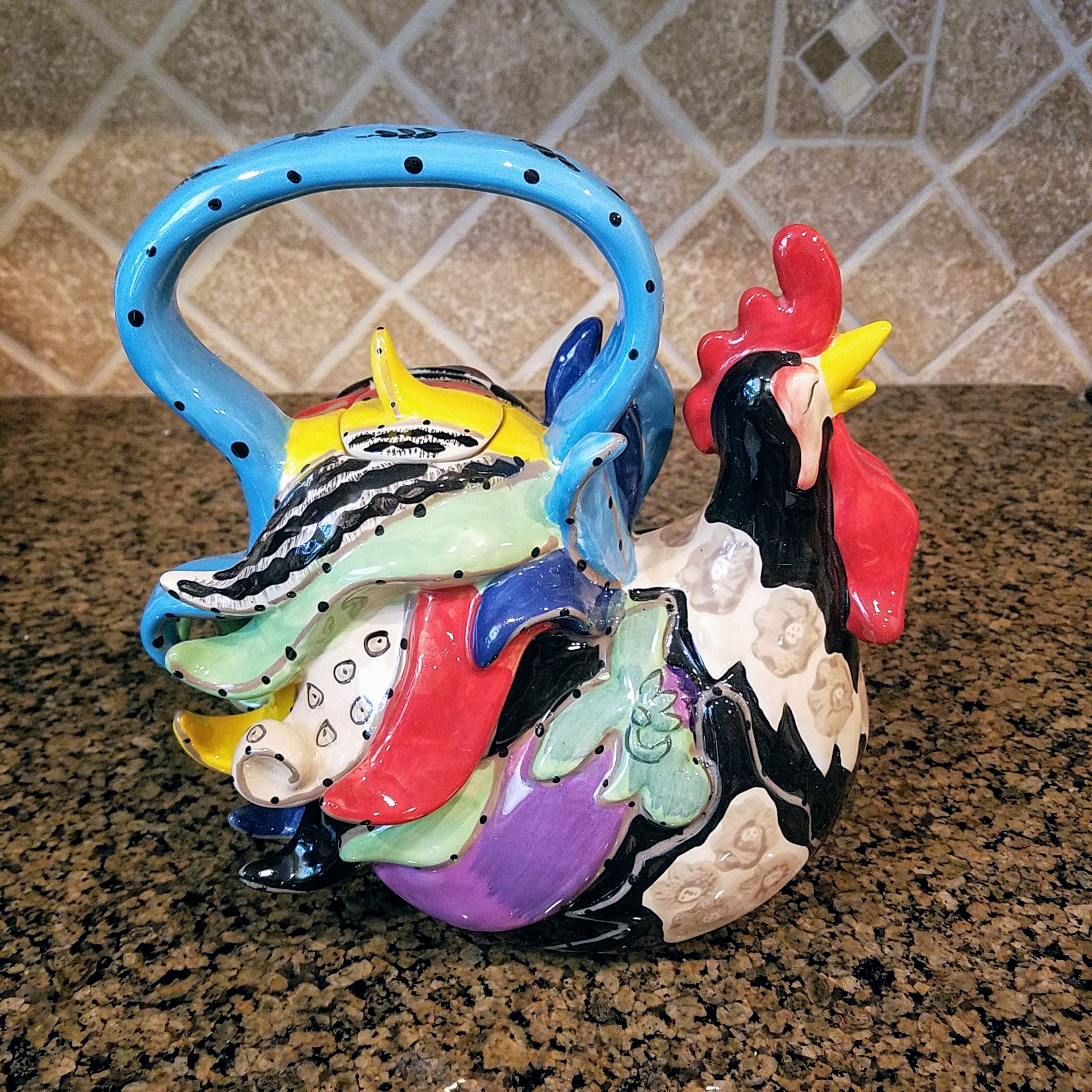 This Rooster Ceramic Teapot Decorative Kitchen Decor New Blue Sky Heather Goldminc is made with love by Premier Homegoods! Shop more unique gift ideas today with Spots Initiatives, the best way to support creators.