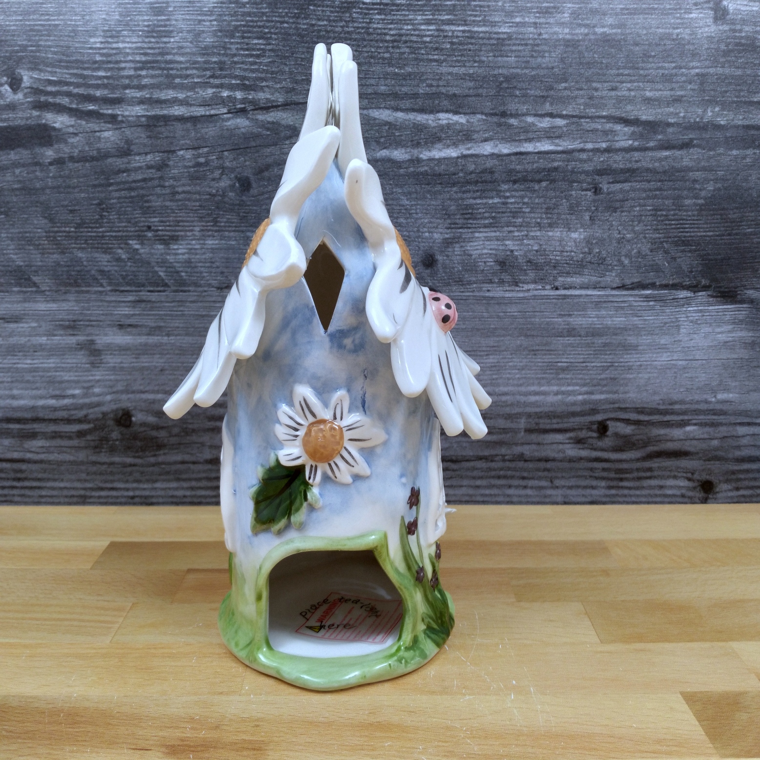 This Blue Daisy Candle House In Full Bloom By Blue Sky Heather Goldminic is made with love by Premier Homegoods! Shop more unique gift ideas today with Spots Initiatives, the best way to support creators.