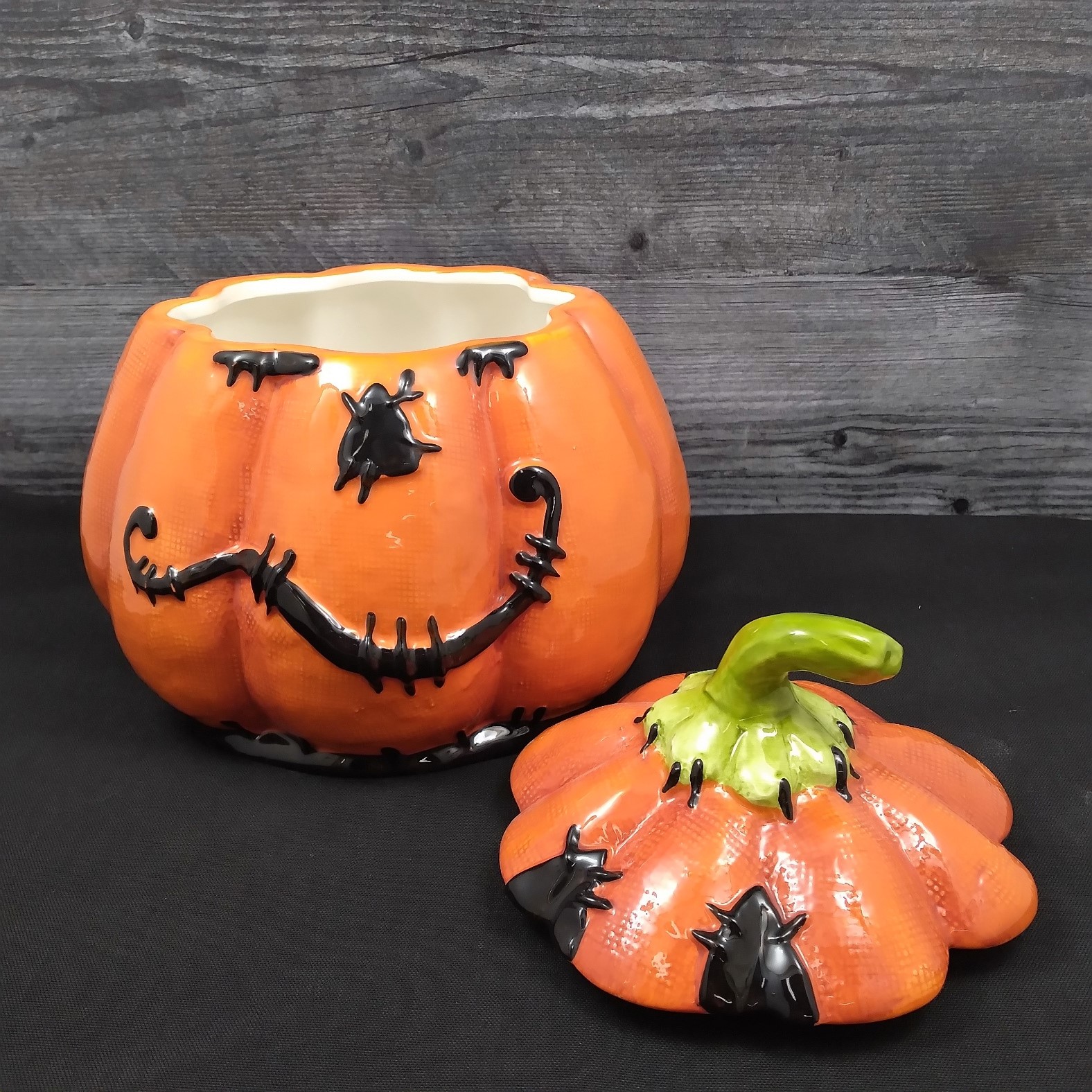 This Halloween Pumpkin Stitched Canister Cookie Treat Candy Jar by Blue Sky Clayworks is made with love by Premier Homegoods! Shop more unique gift ideas today with Spots Initiatives, the best way to support creators.