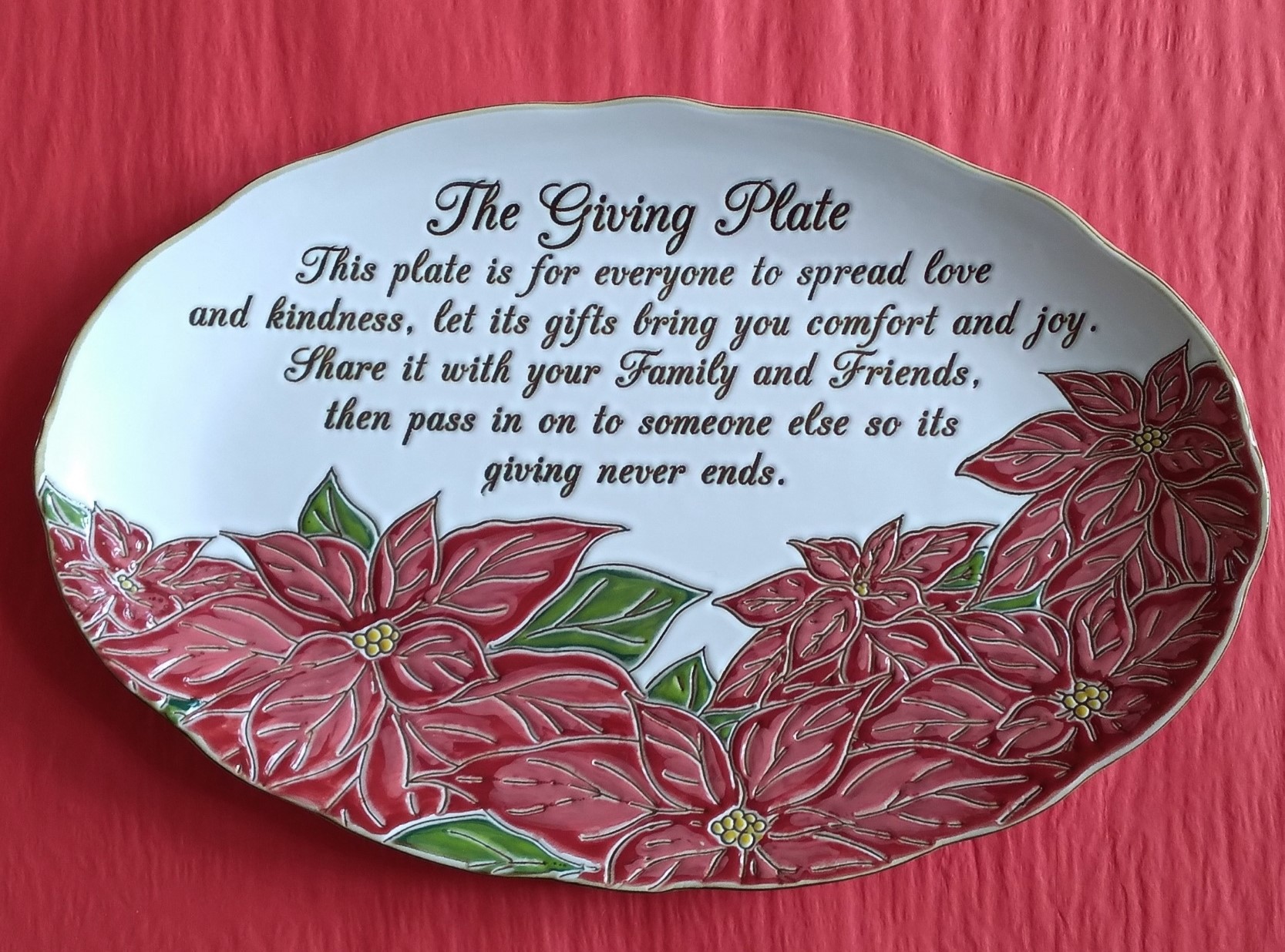 This Cardinal Poinsettia Christmas Giving Platter Plate 14" By Blue Sky Clayworks is made with love by Premier Homegoods! Shop more unique gift ideas today with Spots Initiatives, the best way to support creators.