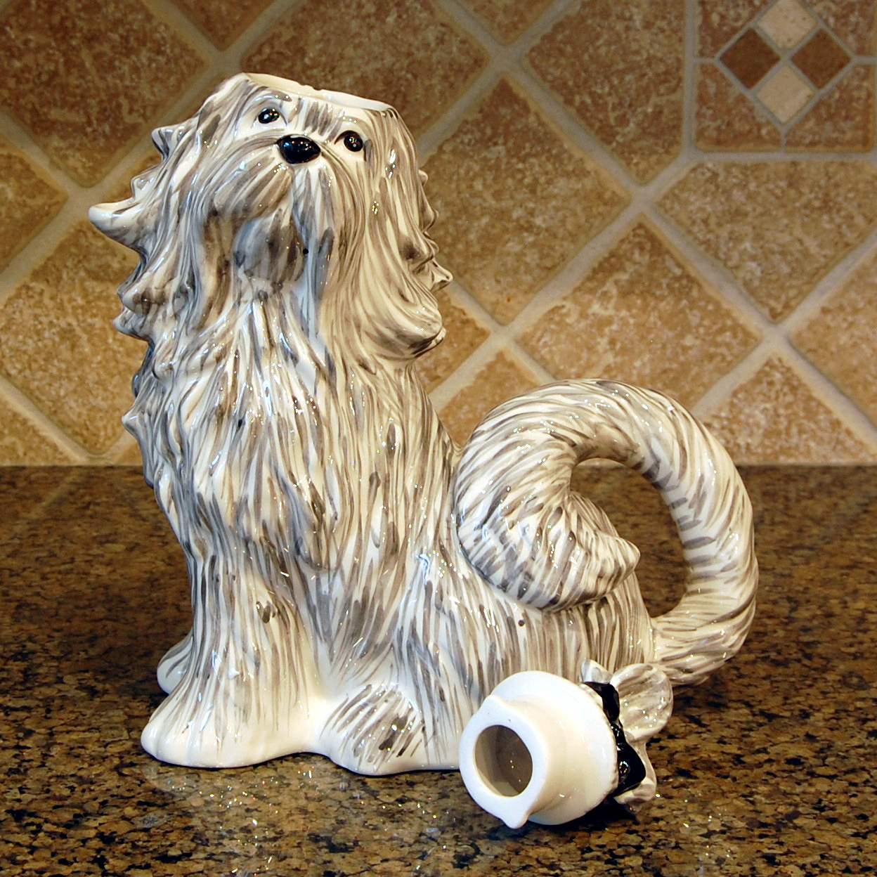 This SHIZ TZU Teapot Collectible Decorative Home Décor Blue Sky Clayworks is made with love by Premier Homegoods! Shop more unique gift ideas today with Spots Initiatives, the best way to support creators.
