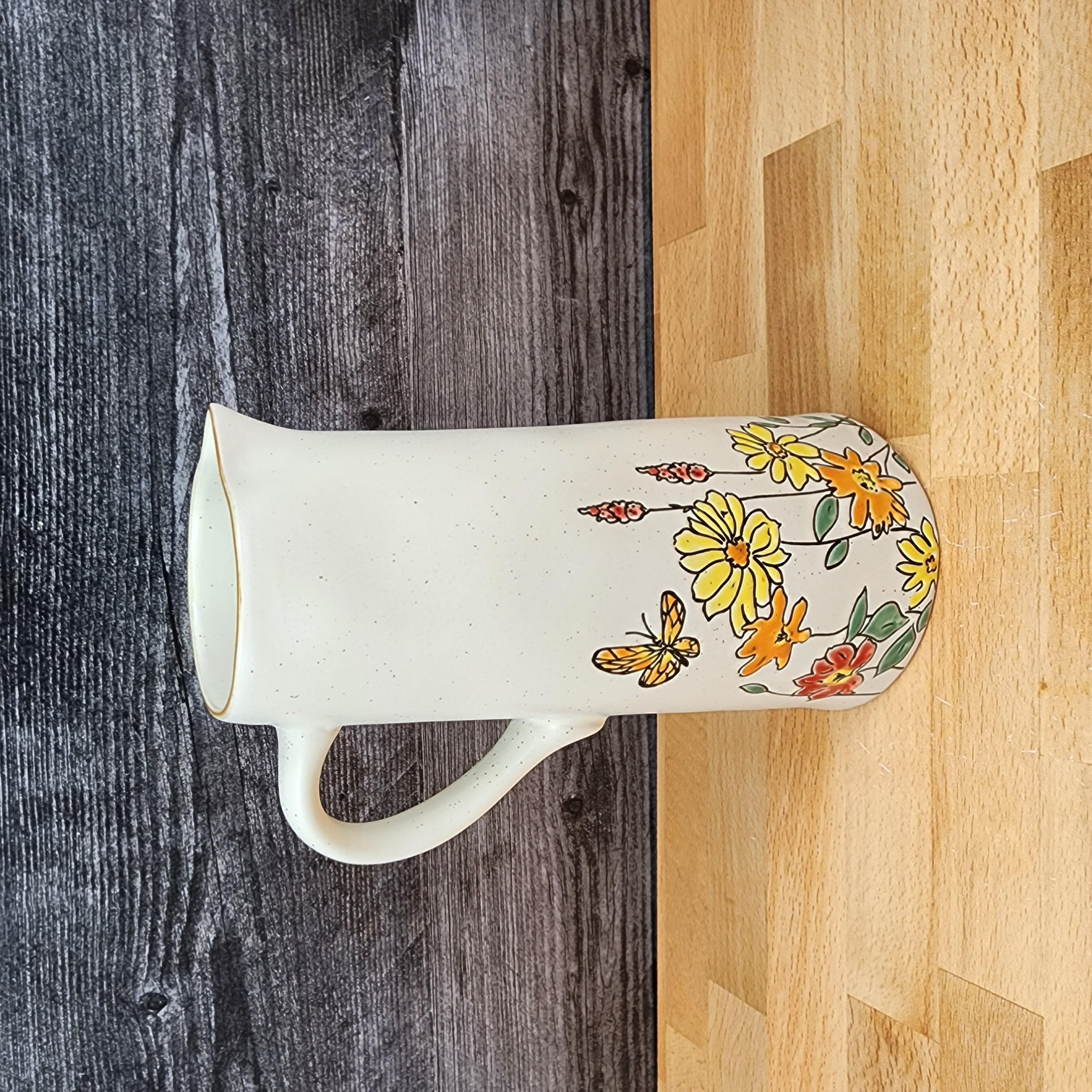This Summer Butterflies and Daisy Embossed Pitcher Decorative Floral Home by Blue Sky is made with love by Premier Homegoods! Shop more unique gift ideas today with Spots Initiatives, the best way to support creators.
