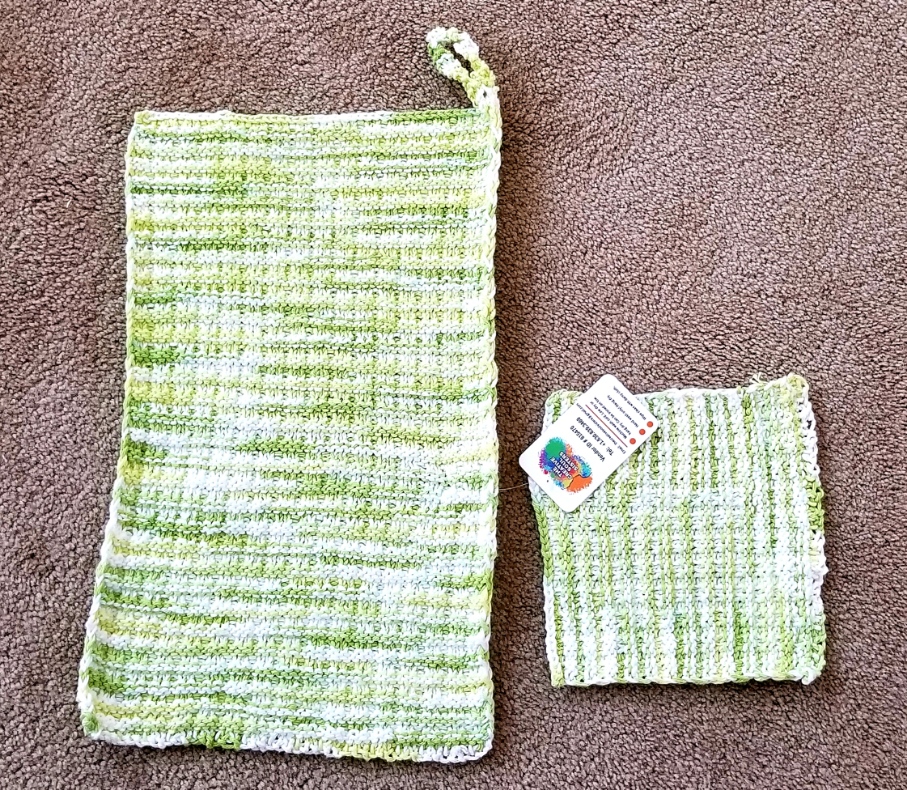 This Hand Knitted Cotton Towel and Dishcloth  in Lemon/Lime - 2 piece set is made with love by The Creative Soul Sisters! Shop more unique gift ideas today with Spots Initiatives, the best way to support creators.