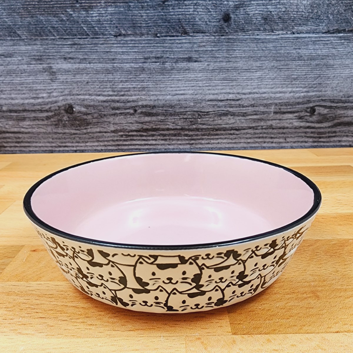 This Cat Water or Food Bowl Embossed Treat Dish in Pink & White Cat Faces By Blue Sky is made with love by Premier Homegoods! Shop more unique gift ideas today with Spots Initiatives, the best way to support creators.