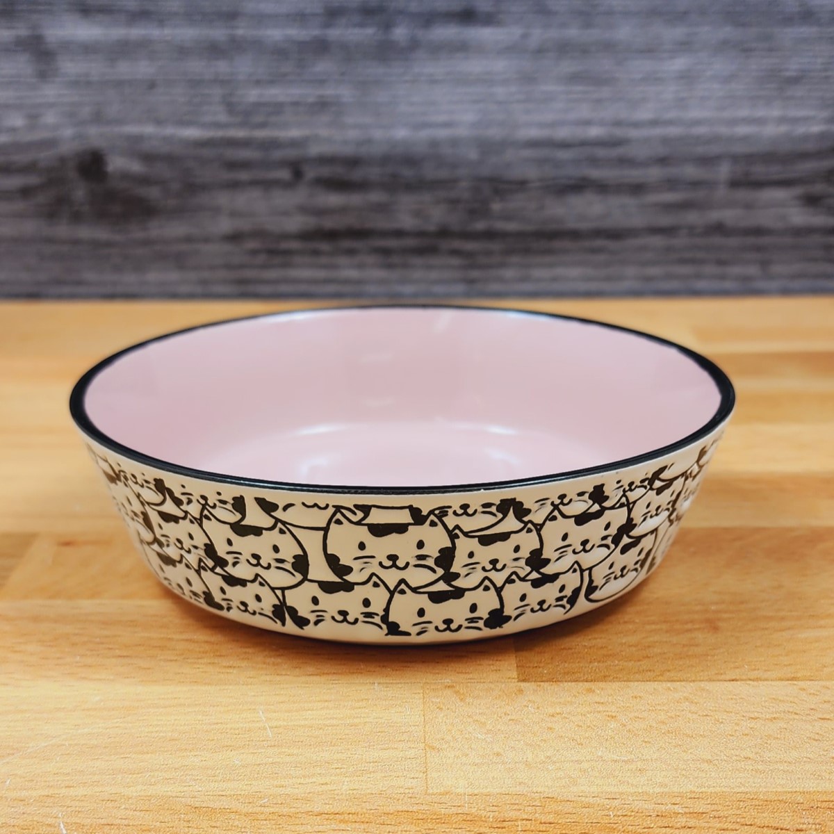 This Cat Water or Food Bowl Embossed Treat Dish in Pink & White Cat Faces By Blue Sky is made with love by Premier Homegoods! Shop more unique gift ideas today with Spots Initiatives, the best way to support creators.
