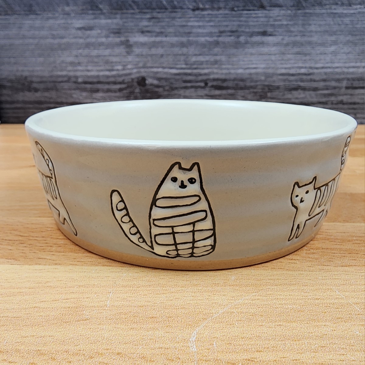 This Cat Water Food Bowl Set of 2 Embossed Treat Dish is made with love by Premier Homegoods! Shop more unique gift ideas today with Spots Initiatives, the best way to support creators.