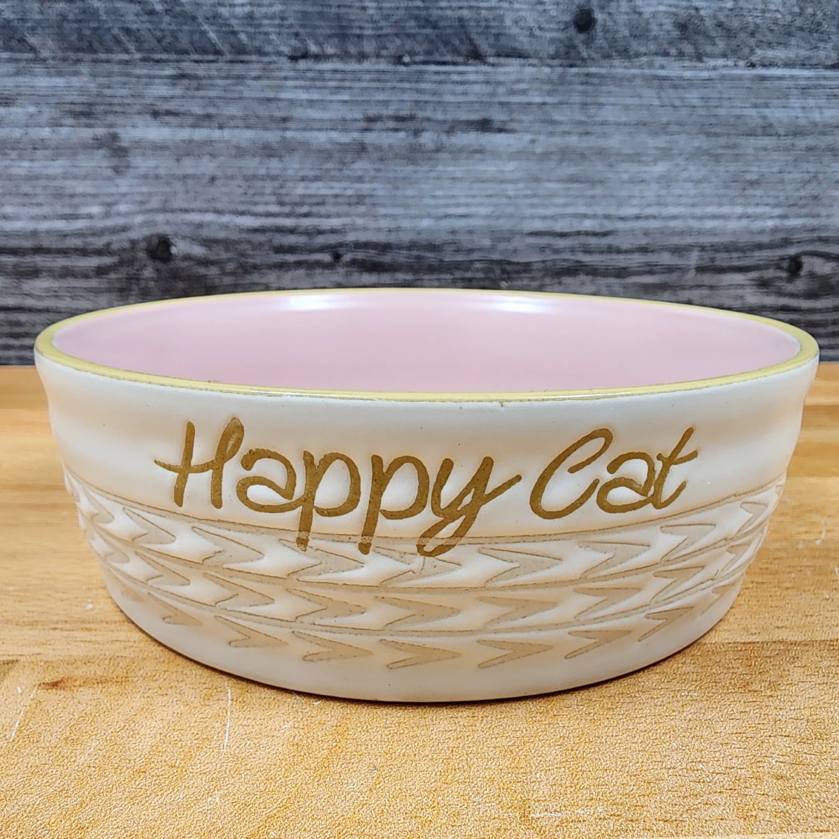 This Happy Cat Water Food Bowl Set Embossed Treat Dish in Pink and White By Blue Sky is made with love by Premier Homegoods! Shop more unique gift ideas today with Spots Initiatives, the best way to support creators.