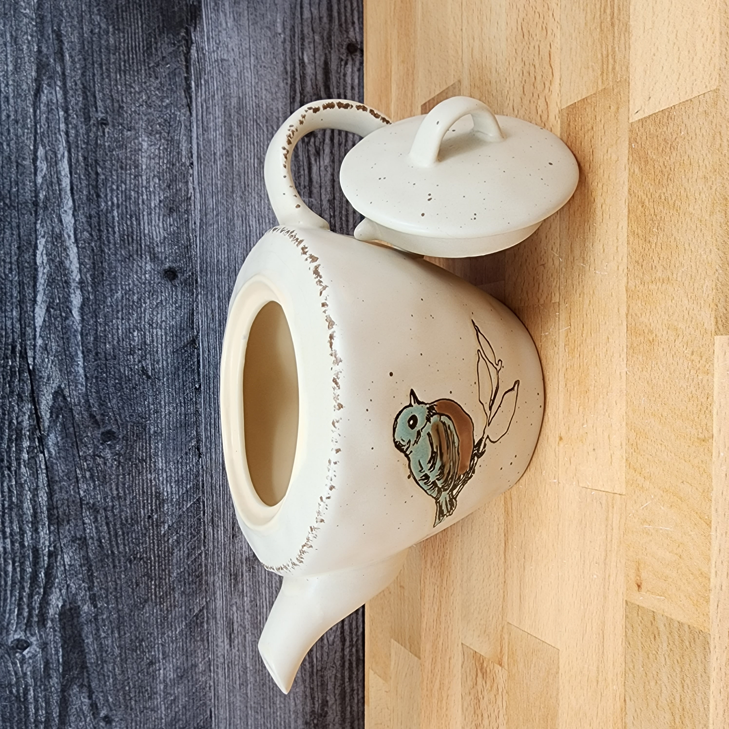 This Embossed Bird Teapot Kitchen Decorative Collectable by Blue Sky is made with love by Premier Homegoods! Shop more unique gift ideas today with Spots Initiatives, the best way to support creators.