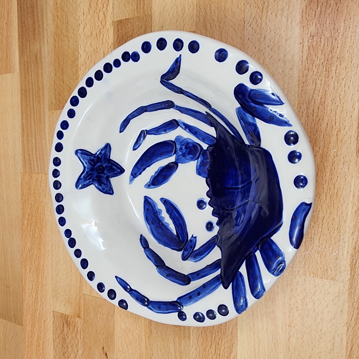 This Blue Crab Soup Bowl Embossed Sea Nautical by Blue Sky is made with love by Premier Homegoods! Shop more unique gift ideas today with Spots Initiatives, the best way to support creators.