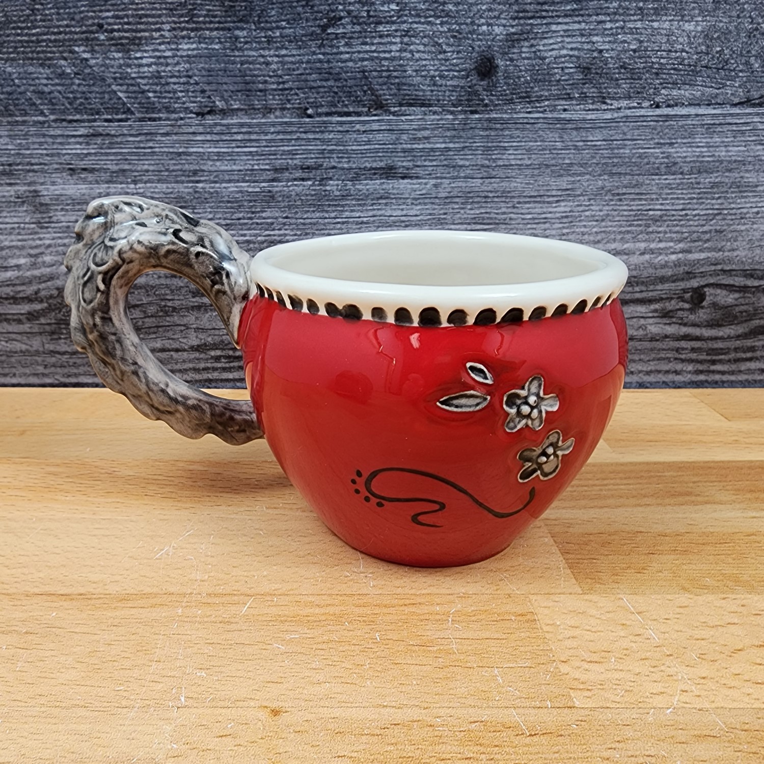 This Red Dragon Decorative Coffee Mug by Blue Sky Clayworks Heather Goldminic Tea Cup is made with love by Premier Homegoods! Shop more unique gift ideas today with Spots Initiatives, the best way to support creators.