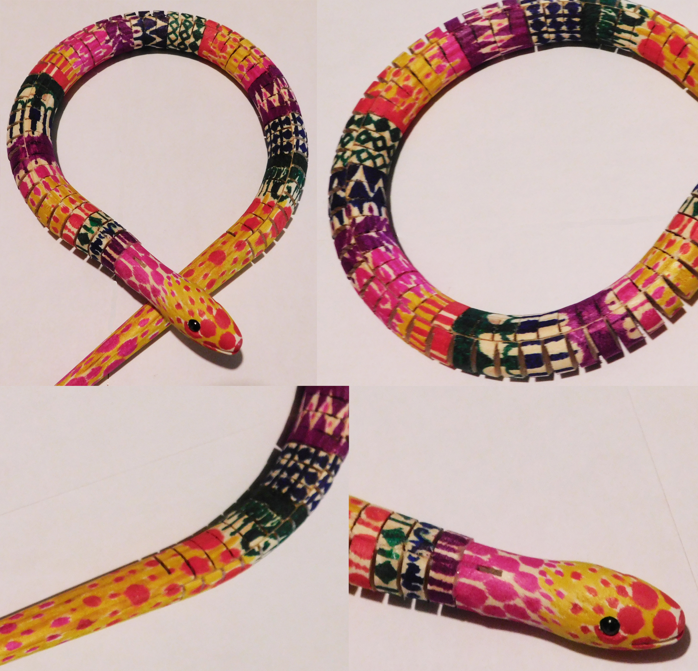 This Colorful Hand Painted Wooden Snake - One of a kind - Reticulated is made with love by The Creative Soul Sisters! Shop more unique gift ideas today with Spots Initiatives, the best way to support creators.