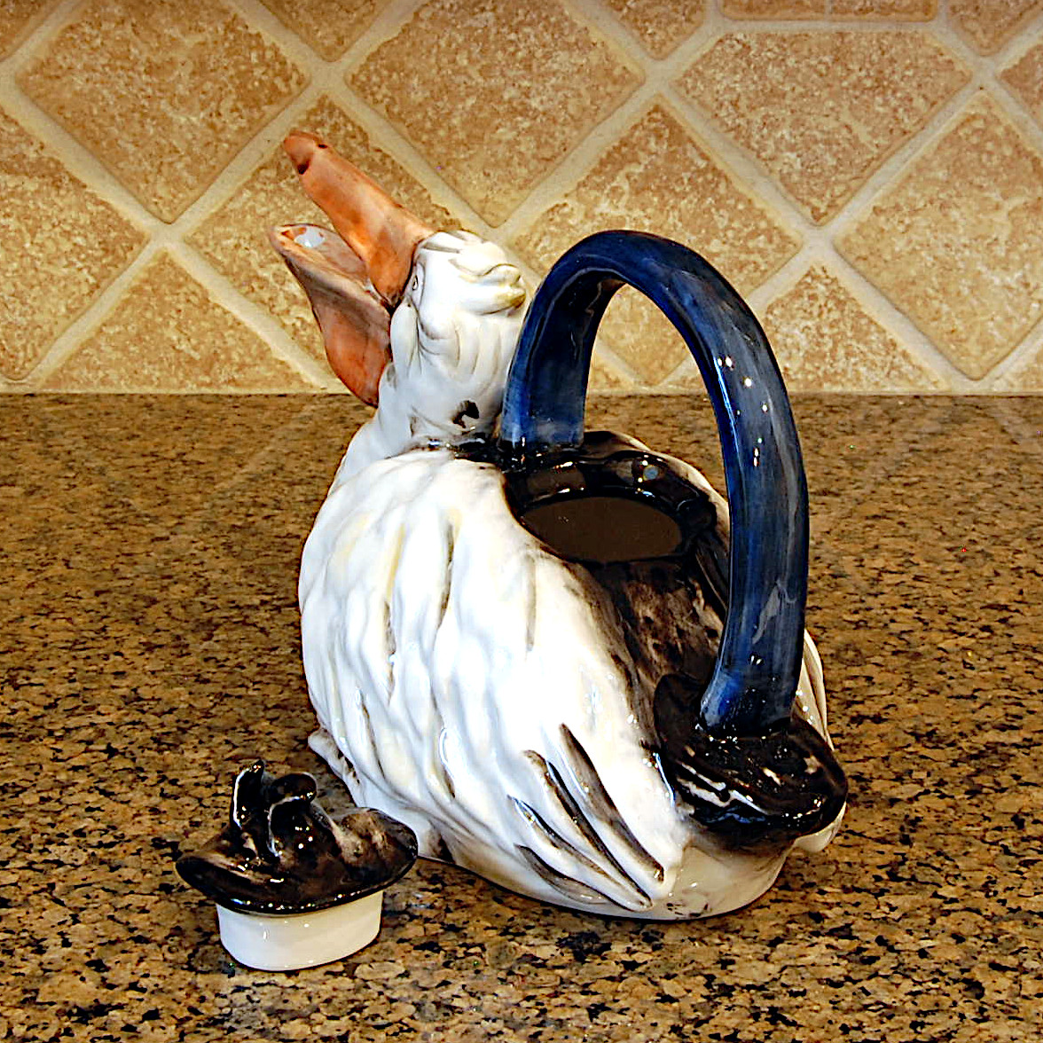 This Pelican Bird Teapot Collectible Decorative Home Décor Blue Sky Clayworks is made with love by Premier Homegoods! Shop more unique gift ideas today with Spots Initiatives, the best way to support creators.