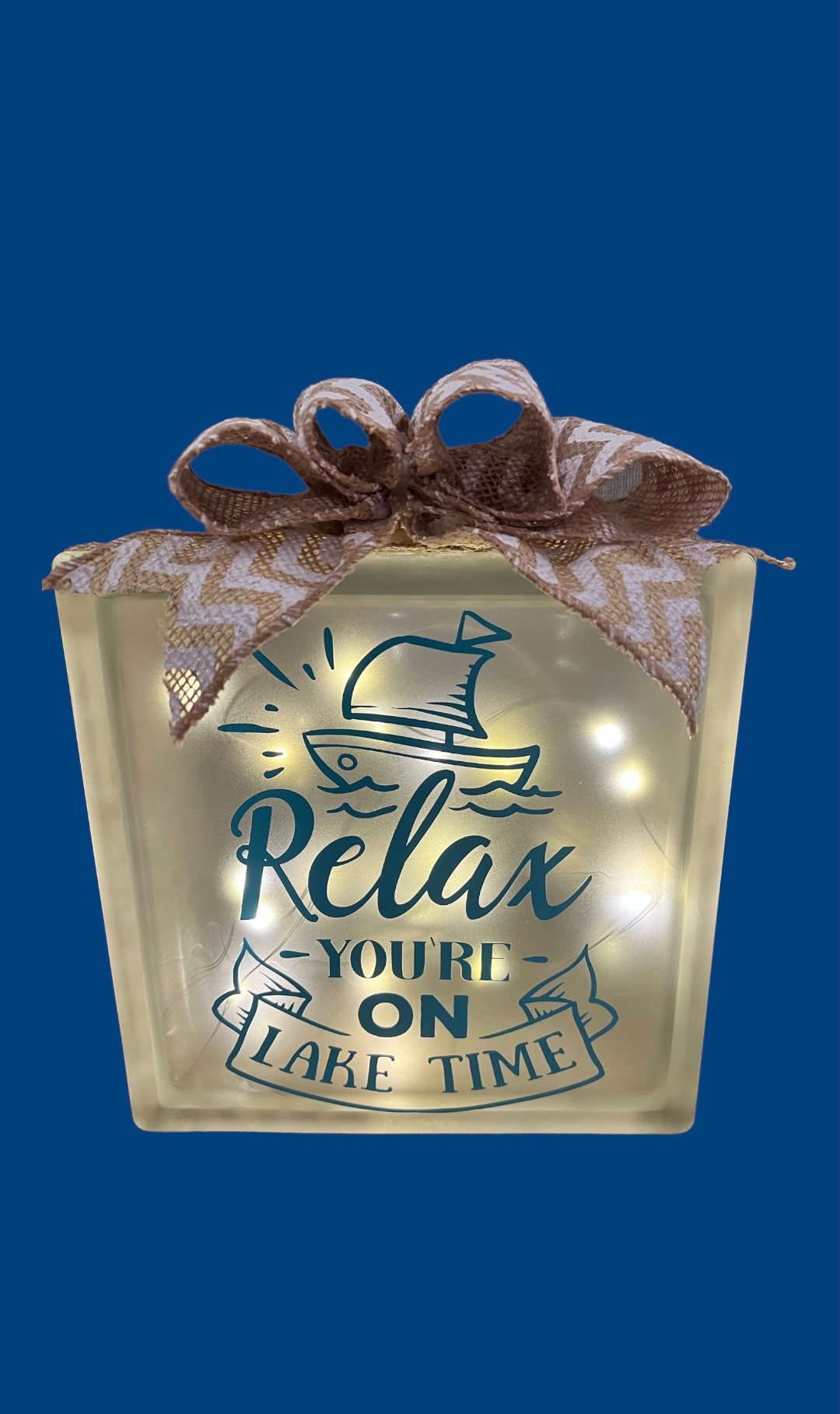 This Relax You're on Lake Time is made with love by Duo Deesigns! Shop more unique gift ideas today with Spots Initiatives, the best way to support creators.
