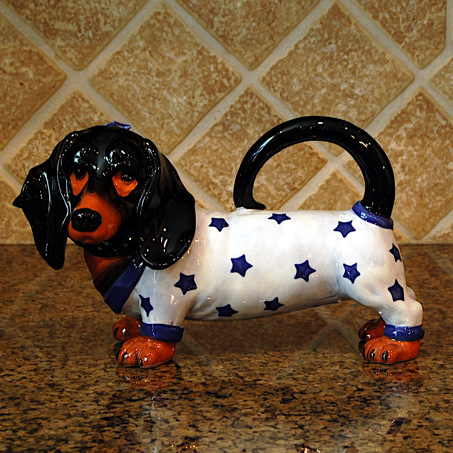 This Willie Dachshund Dog Teapot Collectible Decorative Home Décor Blue Sky Clayworks is made with love by Premier Homegoods! Shop more unique gift ideas today with Spots Initiatives, the best way to support creators.